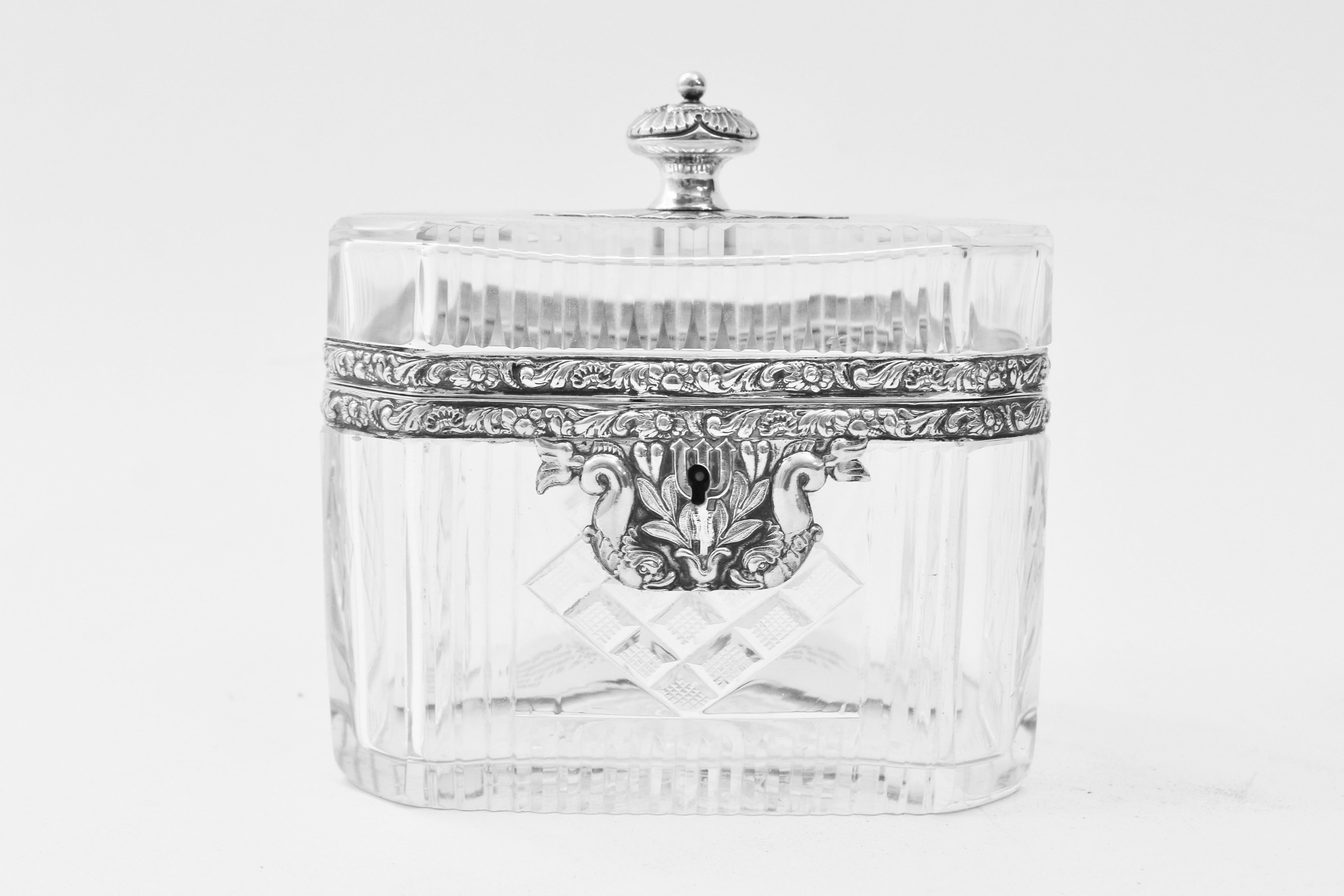 Rectangular continental cut glass box with silver mounts circa 1900. The cut glass body with diamond formation hobnail cut sections on all sides, framed by slice cut detailing on the front and sides, and around the rim of the lid. The silver mounts