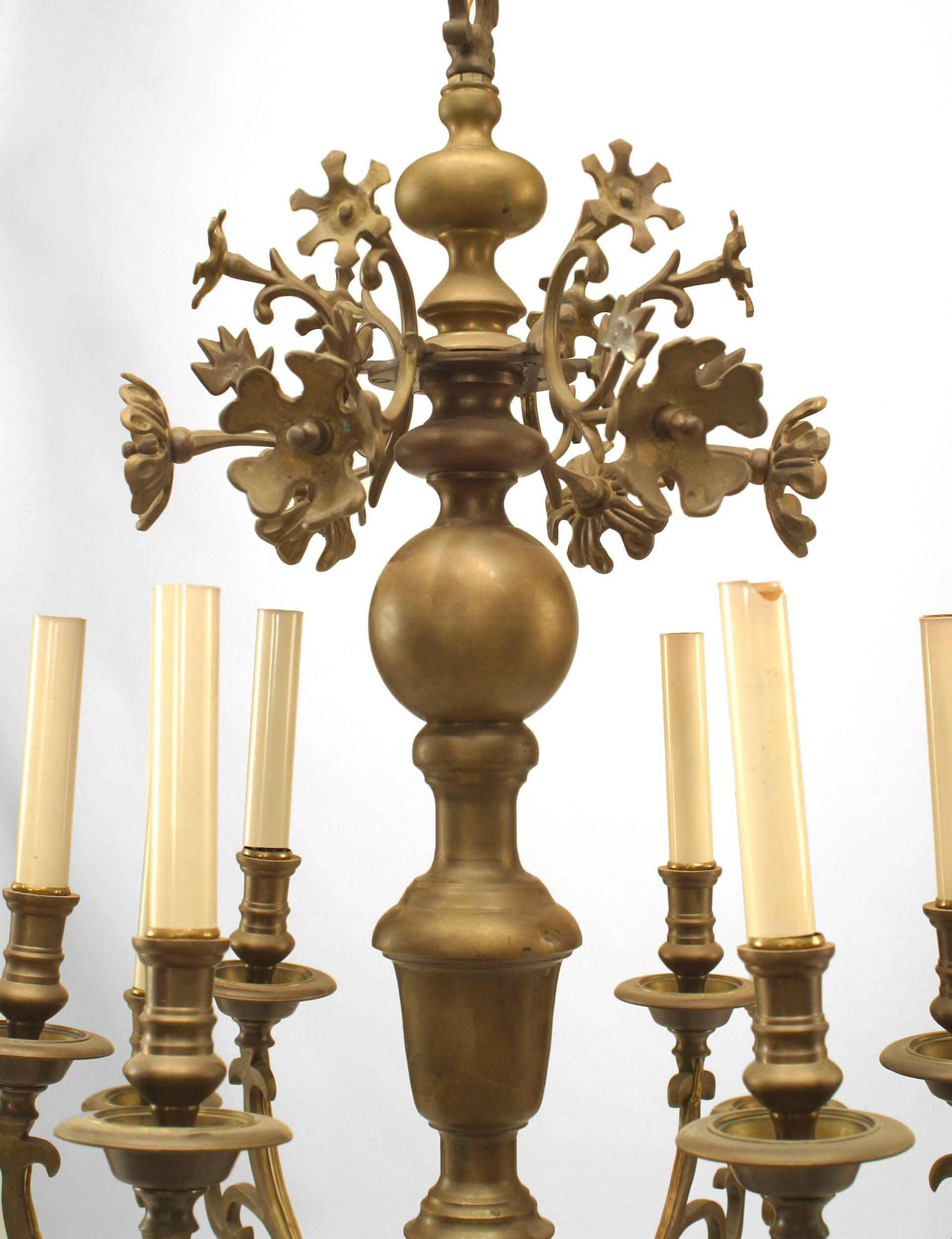 Continental Dutch (19th Century) style brass chandelier with 6-2 tier scroll form arms and floral upper section.
