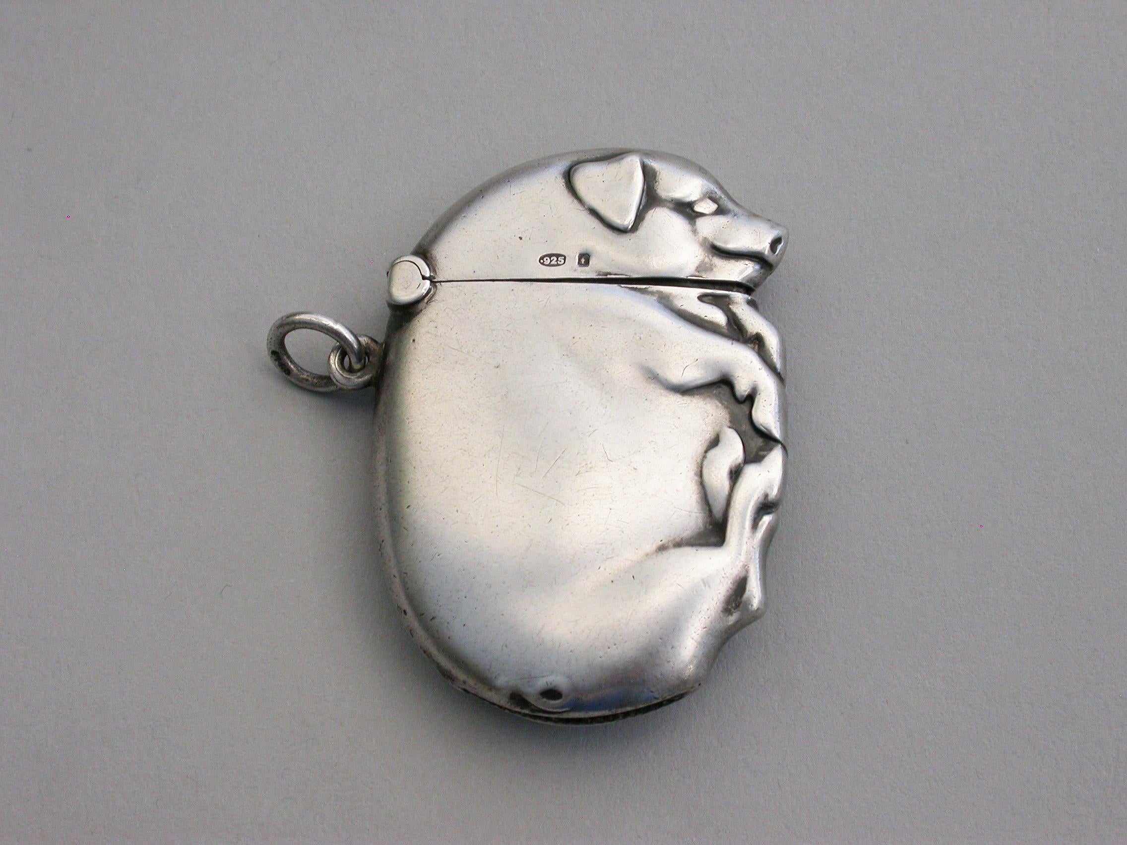 A good Edwardian Continental novelty silver vesta case made in the form of a flat sleeping pig, with hinged flip-top lid and attached suspension ring.

Import marks for Marks & Cohen, Birmingham, 1905 

Weight 18.00 Grams (0.58 troy ounces).