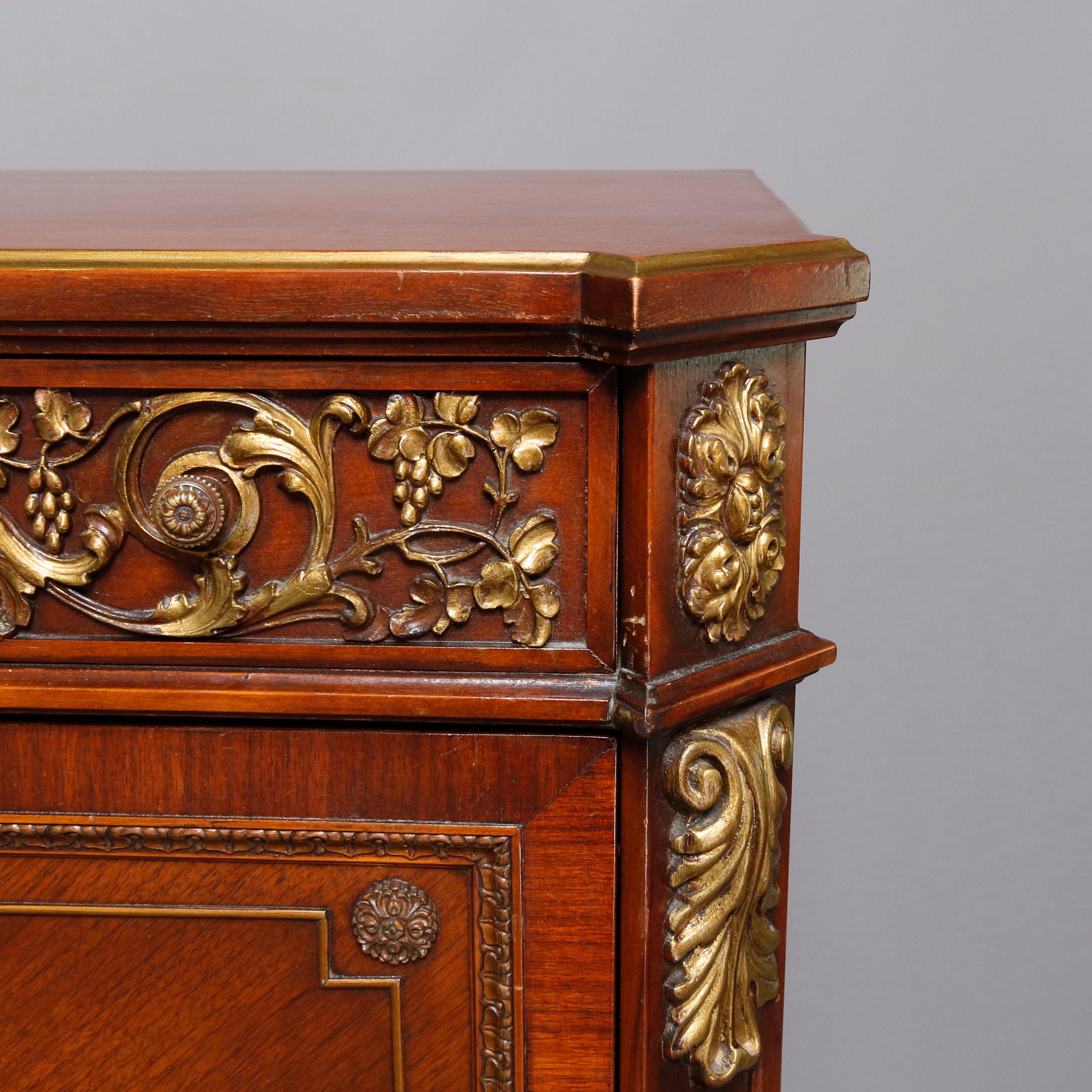 A continental French Louis XV style abattant offers mahogany construction with upper lng drawer having cast bronze scroll and foliate mounts over drop front secretary desk having bookmatched veneering with central hand painted Victory decoration