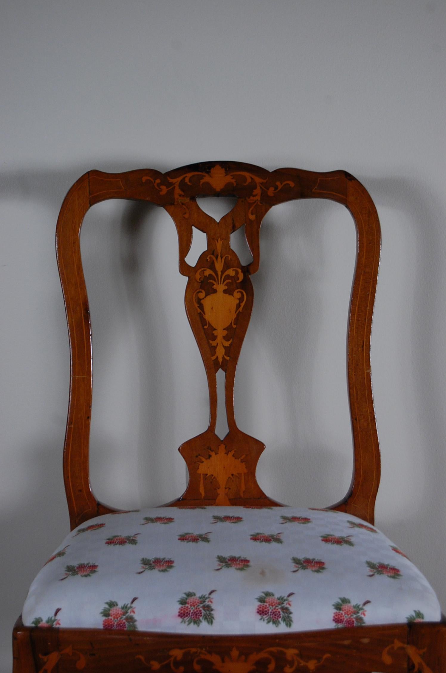 An Italian side chair in fruitwood nicely inlaid with swags and urns.