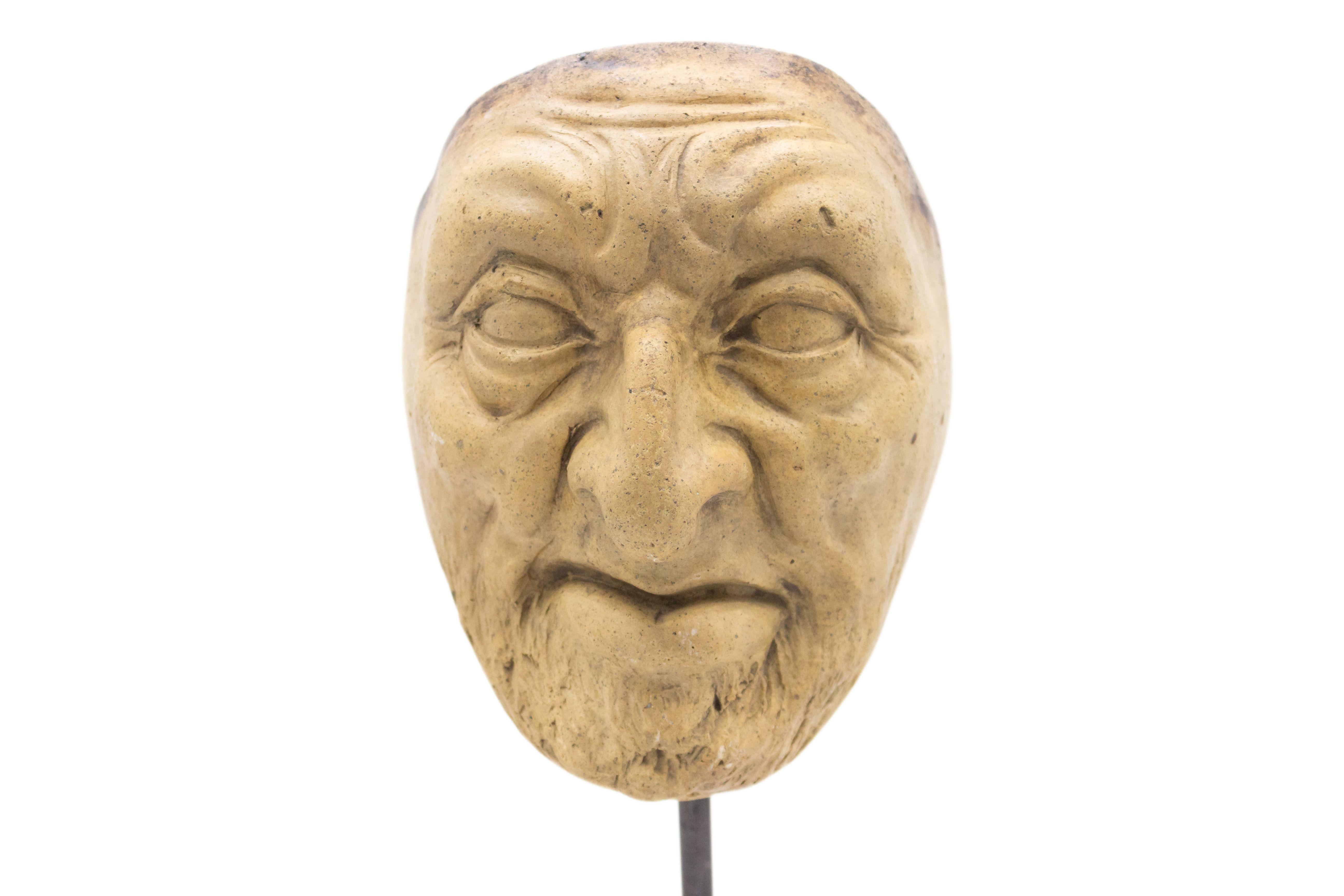 Marble Continental German Terra-Cotta Mask For Sale