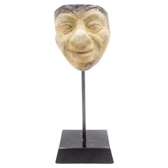 Máscara de terracota alemana continental
