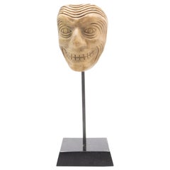 Máscara de terracota alemana continental
