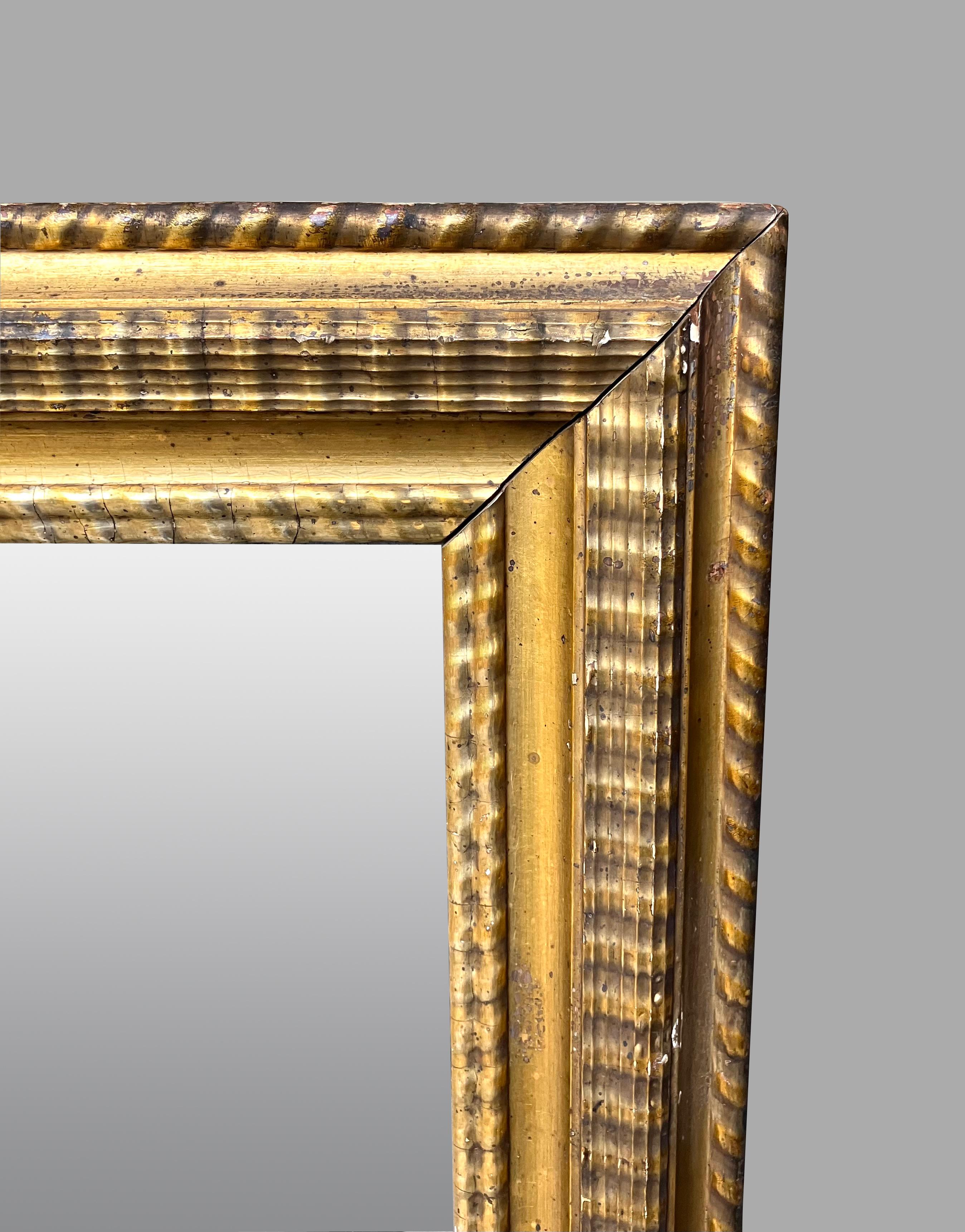 Composition American Nineteenth Century Giltwood Mirror Retaining Its Original Glass Plate For Sale