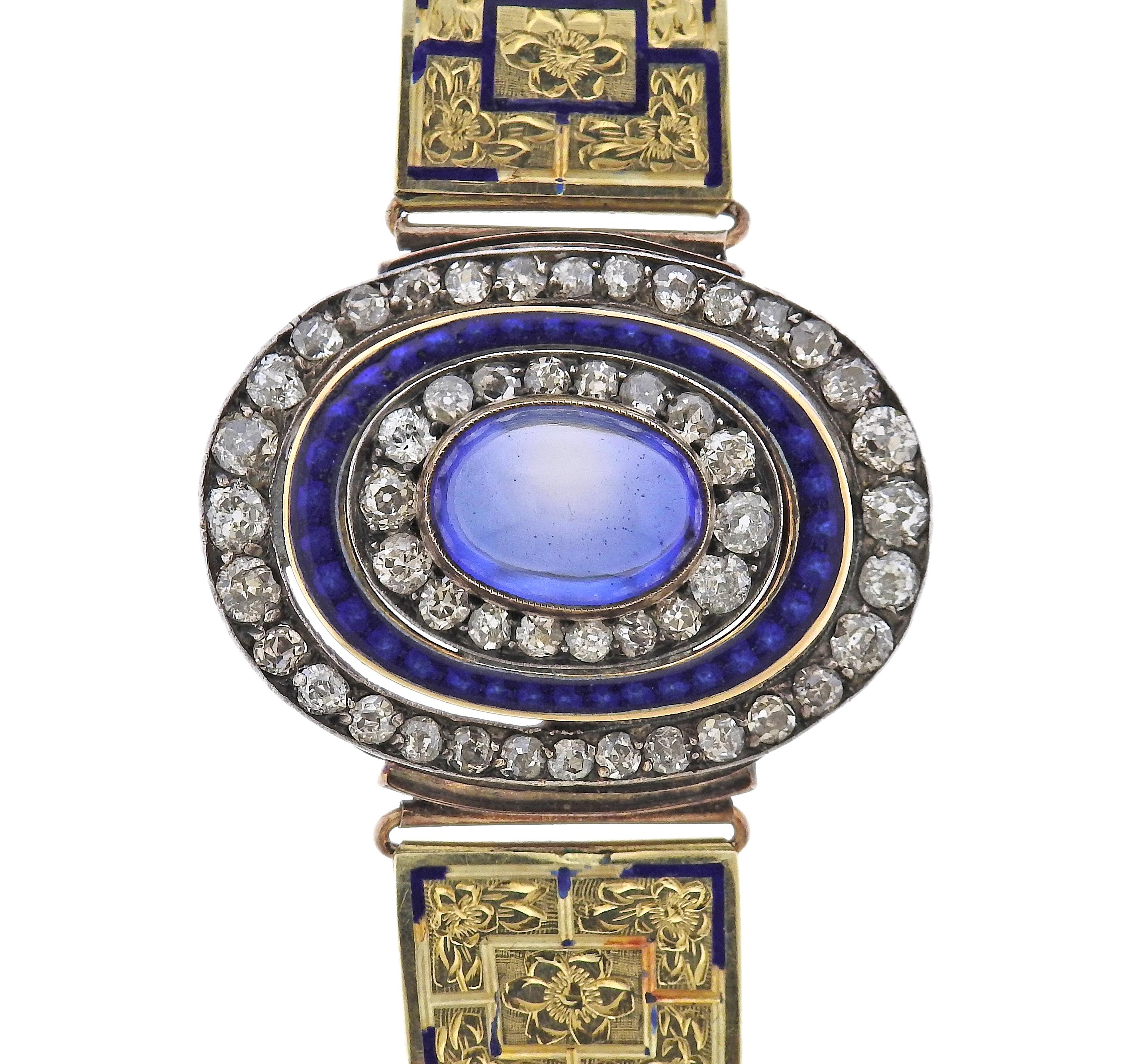 Continental 14k gold bracelet, with center blue stone cabochon, blue enamel (some loss of enamel is present on the bracelet), and approx. 2.40ctw in diamonds. Bracelet is 6 1/8