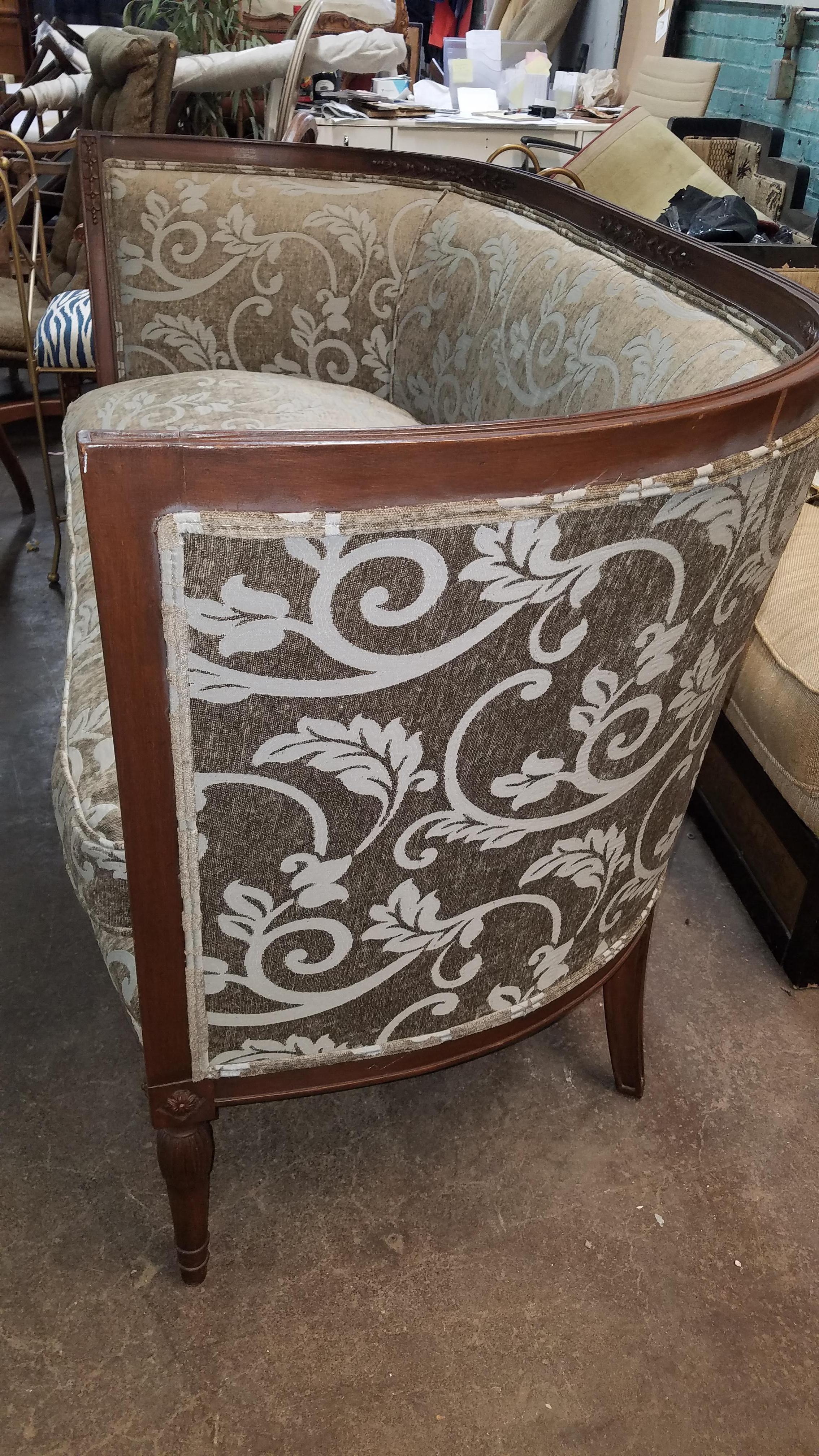 Stylish high arm hand carved walnut French Louis XV style loveseat newly recovered in grayish sage and pale blues cut velvet fabric. Wonderful old frame from the 1930s in great condition, with a single down cushion.
   