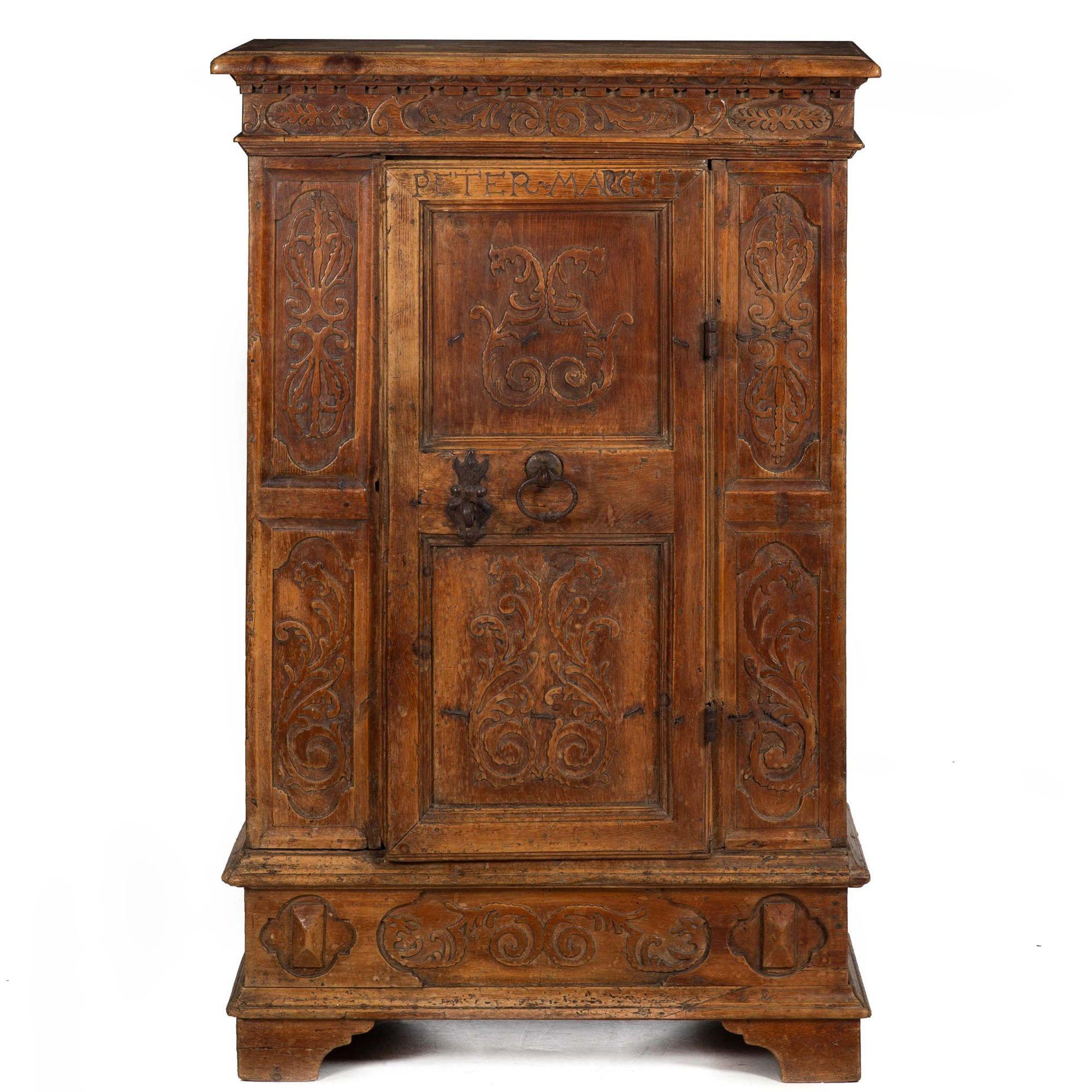 CONTINENTAL HEAVILY WORN AND CARVED ONE-DOOR CUPBOARD OF SMALL DIMENSIONS
Composed of 18th century and later elements, likely constructed in the late 19th/early 20th century  of fantastic proportions
Item # 403LFT18P

A super cool and heavily worn