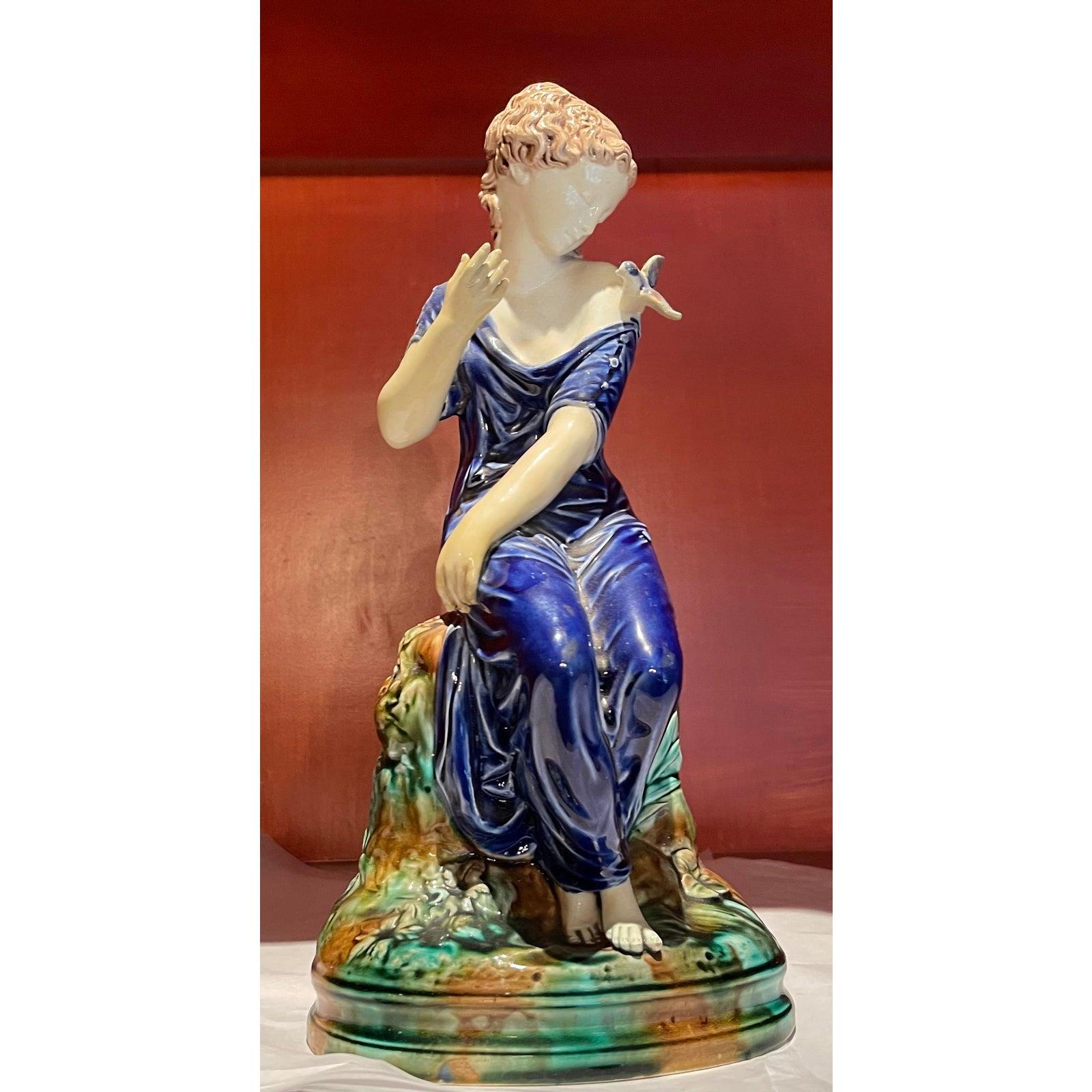 French Provincial Continental Majolica Pottery Figure of a Lady and Bird, 19th Century For Sale