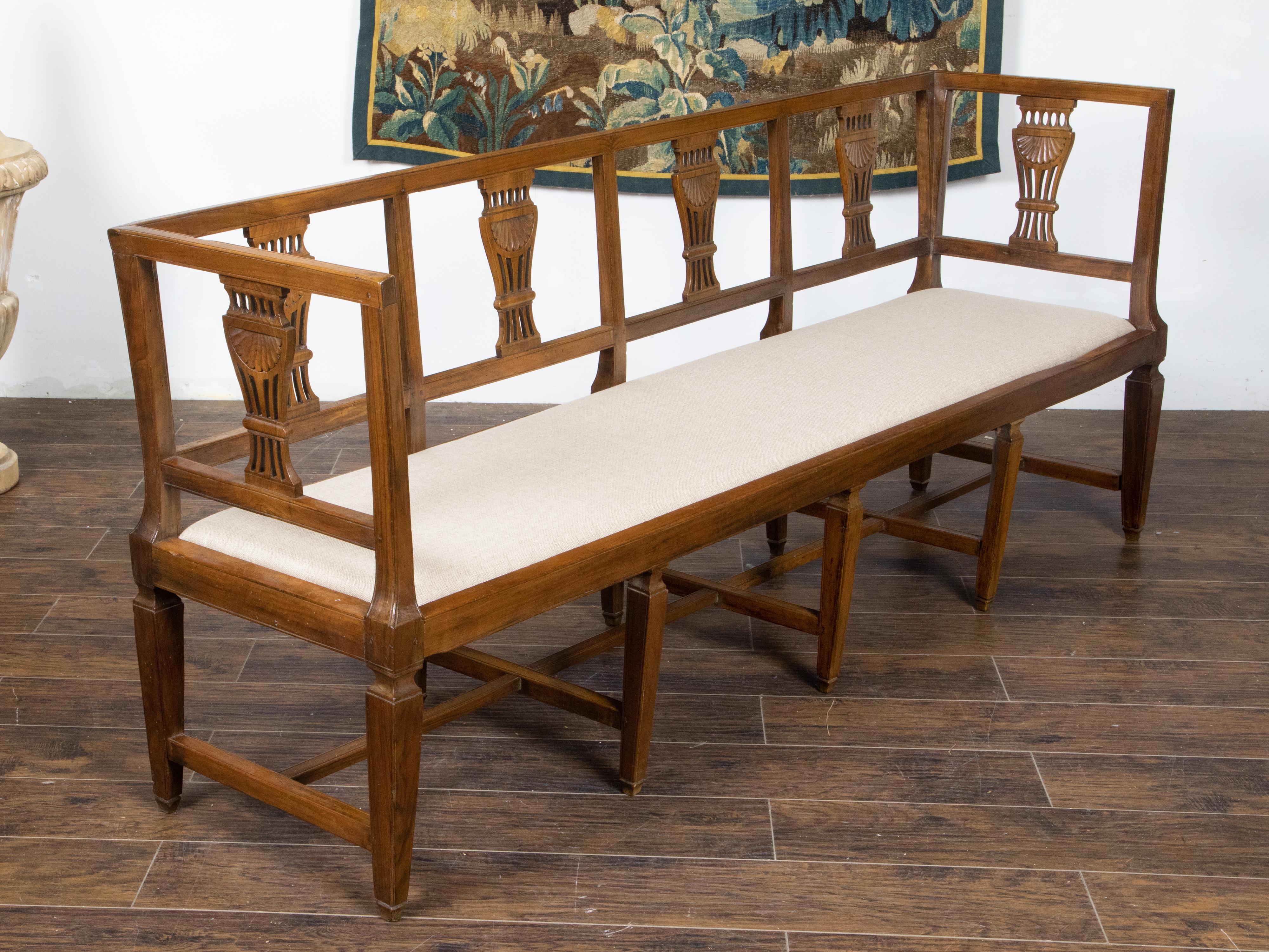 European Continental Neoclassical Style Walnut 19th Century Settee with Carved Splats For Sale