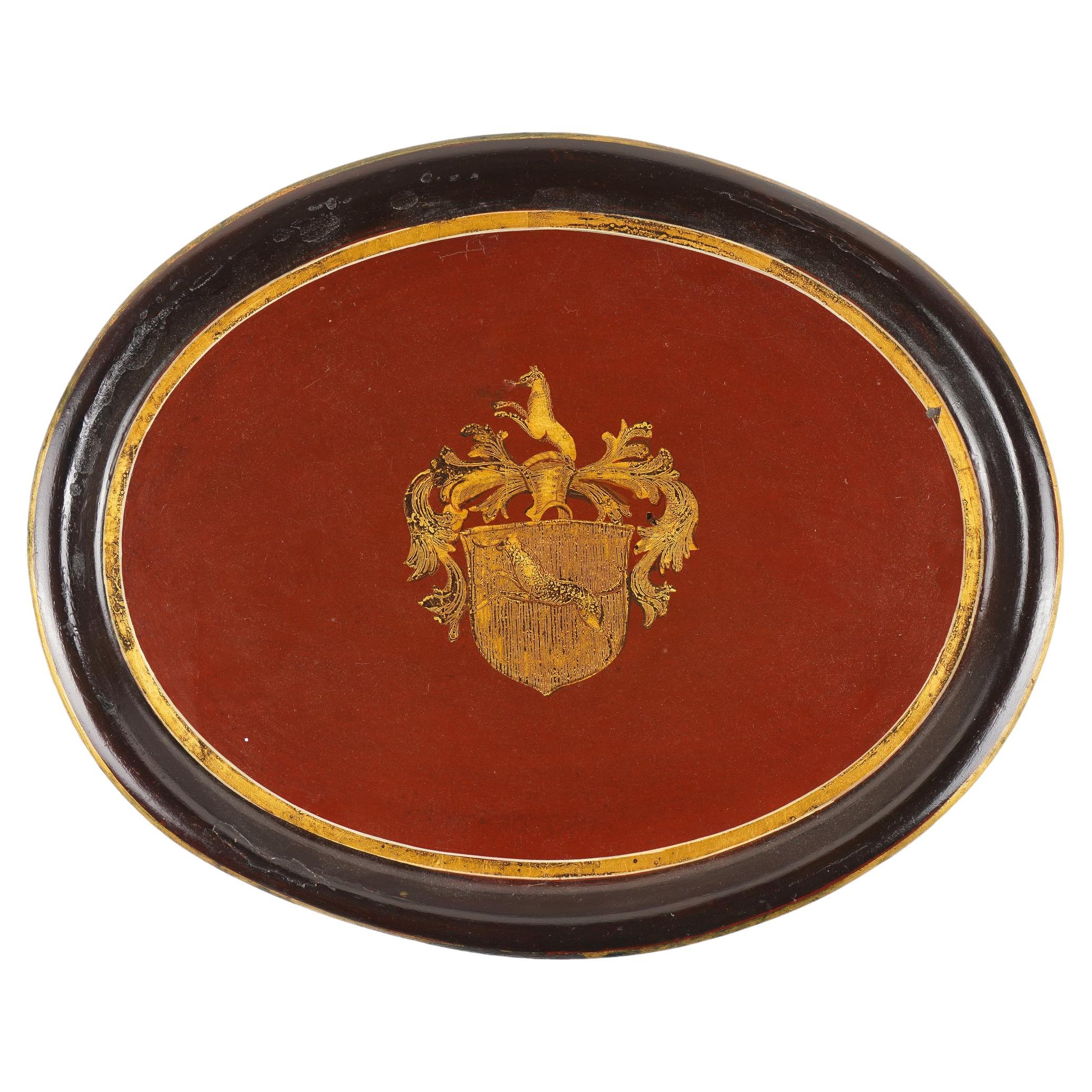 Continental oval tole tea tray with gilt armorial, 1825-50 For Sale