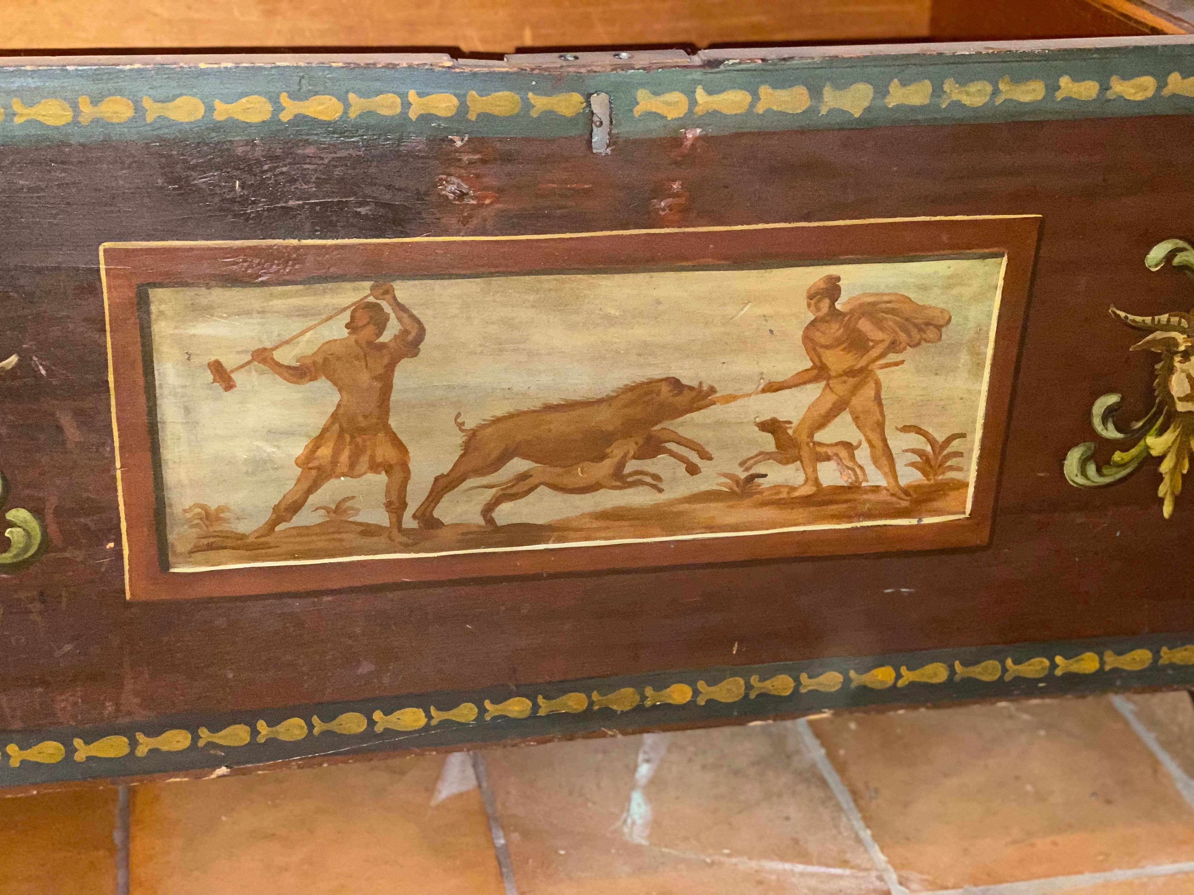 A continental painted wood trunk
Late 19th-early 20th century
With neoclassic motifs and figural reserves
Measures: 24 in. high, 44 in. wide, 19 in. deep
Fading and discoloration, some surface wear
Separation at the seams of frame, splitting on