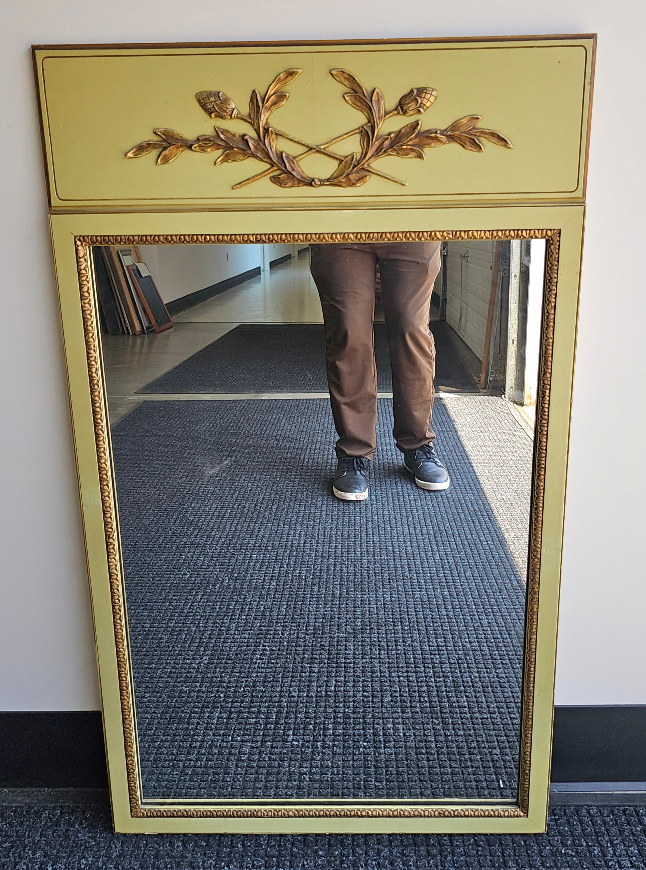 A Continental Partial Gilt and Green Painted and Decorated Frame Mirror
Measures 24.5