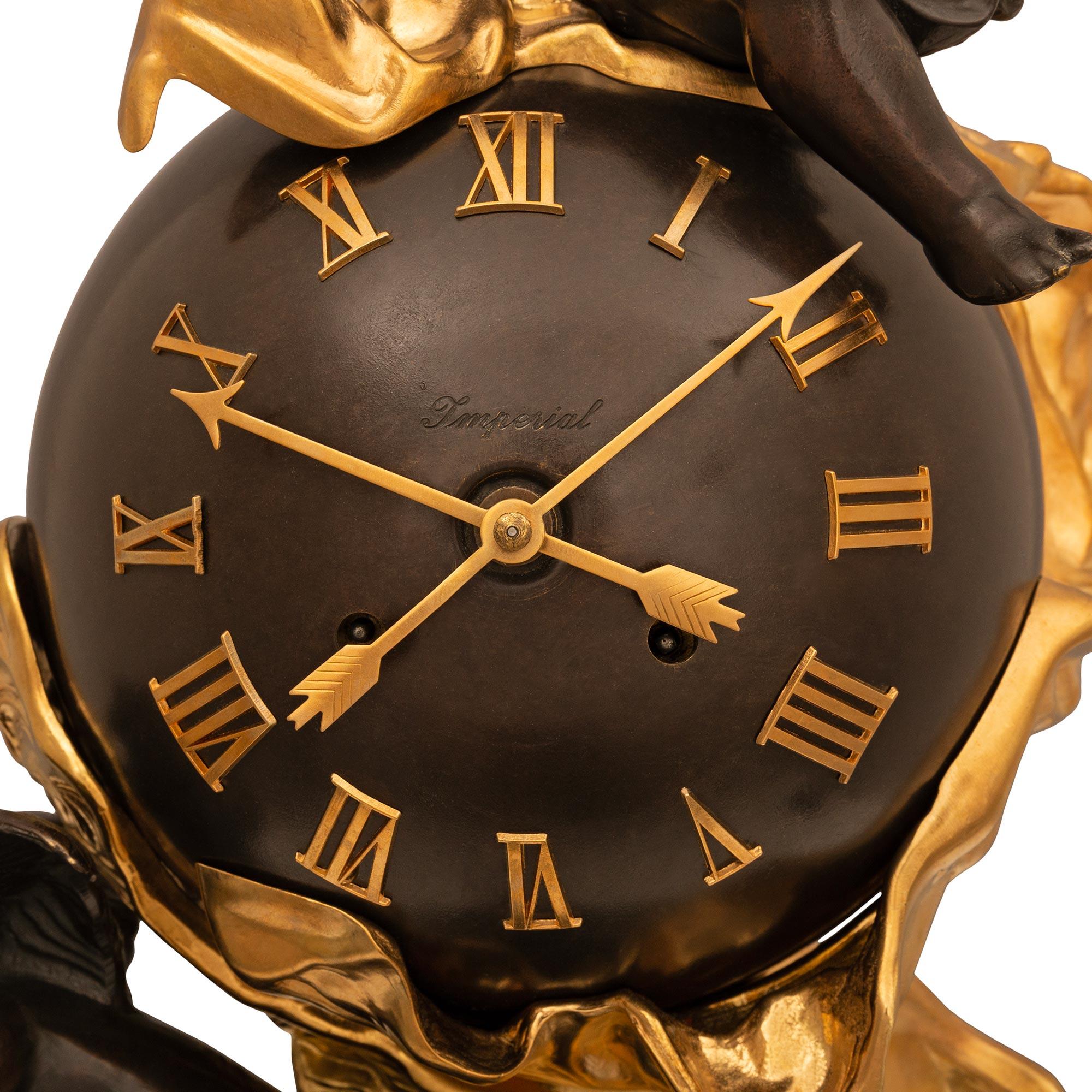 20th Century Continental Patinated Bronze and Ormolu Clock, signed Imperial For Sale