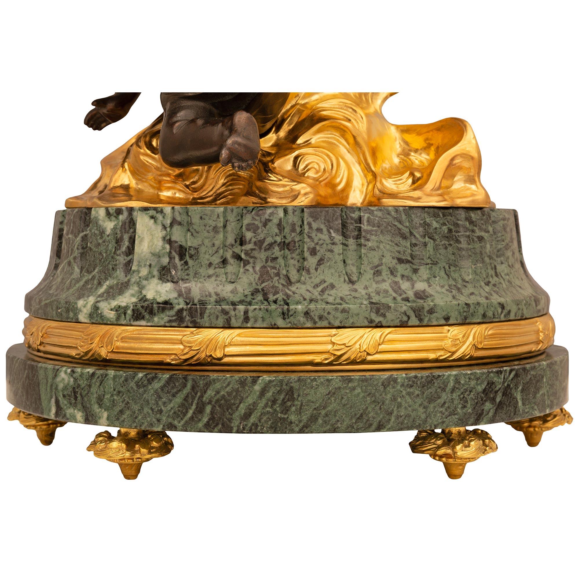 Continental Patinated Bronze and Ormolu Clock, signed Imperial For Sale 3