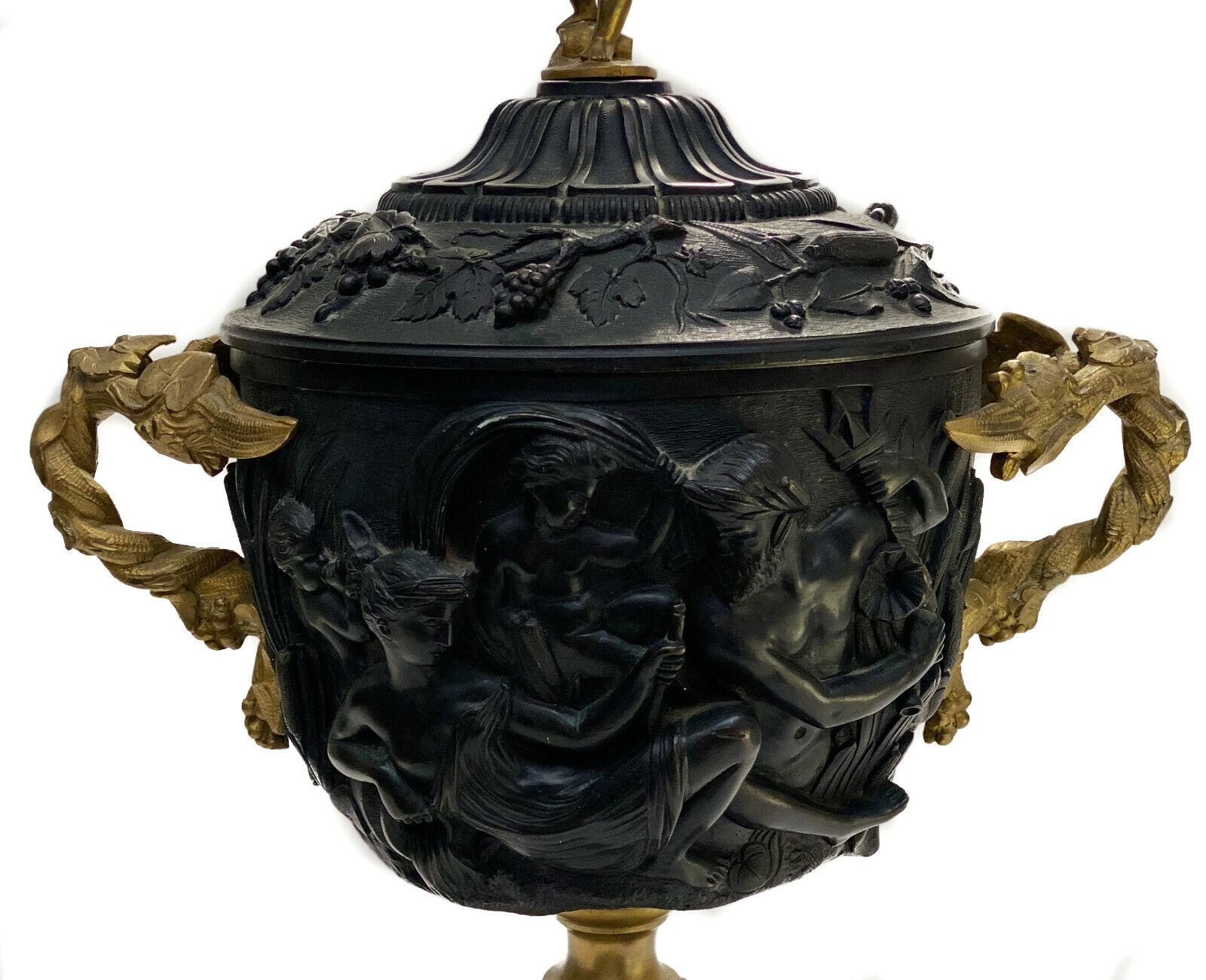 Continental Patinated & gilt bronze twin handled cup or urn with liner, c.1900

Figural cherubs to the exterior of the cup with gilt leaf handles. A cherub to the finial of the lid. Mounted on a marble base. Likely French.

Additional
