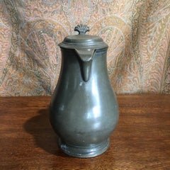 Continental Pewter Covered Jug, Baluster Shaped with Shell Thumb Piece