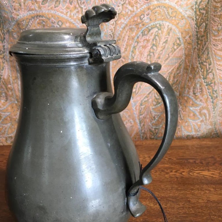Continental Pewter Covered Jug, Baluster Shaped with Shell Thumb Piece For Sale 1