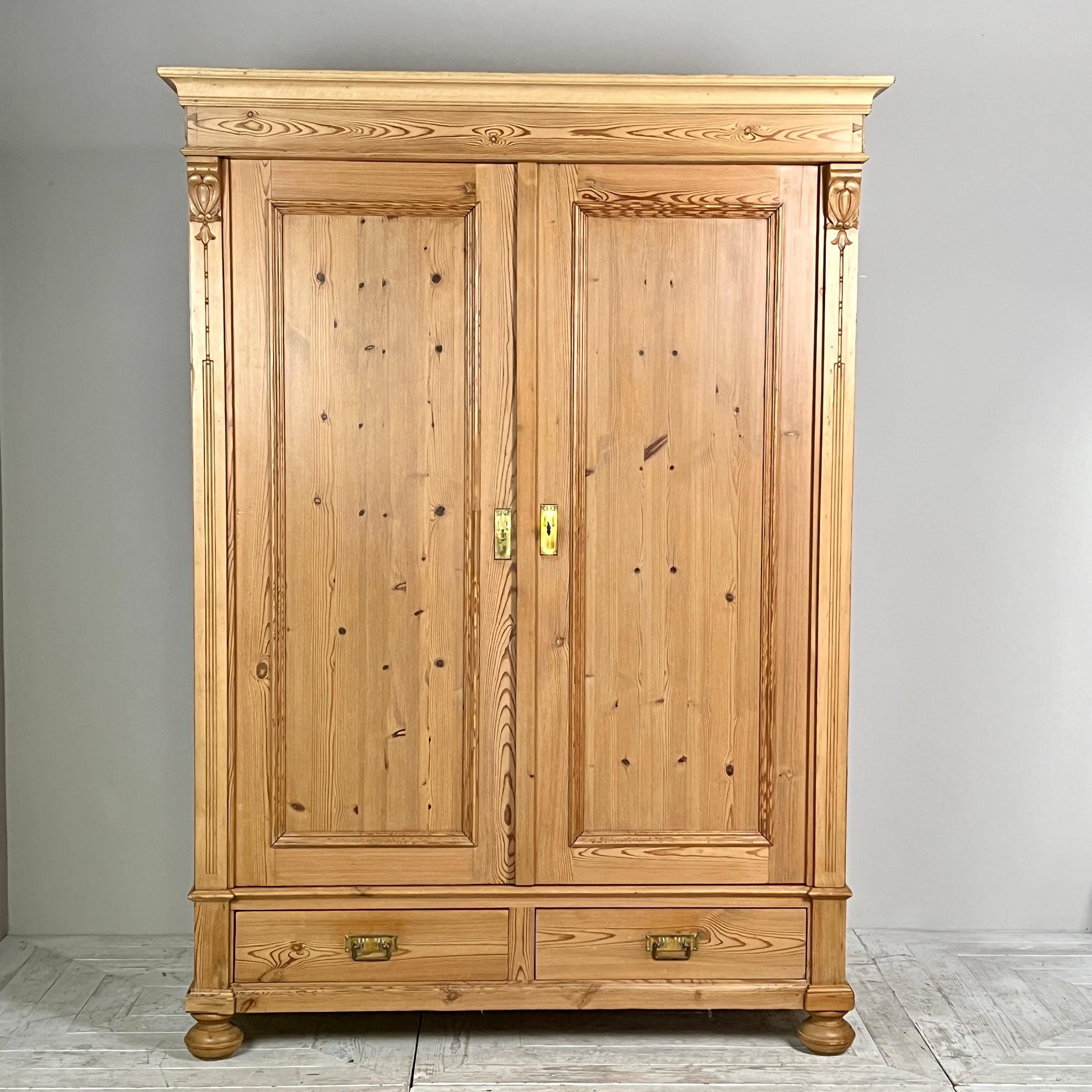 This lovely Continental Pine Art Nouveau Wardrobe features a convenient Knockdown design, making it collapsible for easy transportation. The wardrobe includes a Cavetto cornice atop two panelled doors that open to a cupboard with a brass hanging