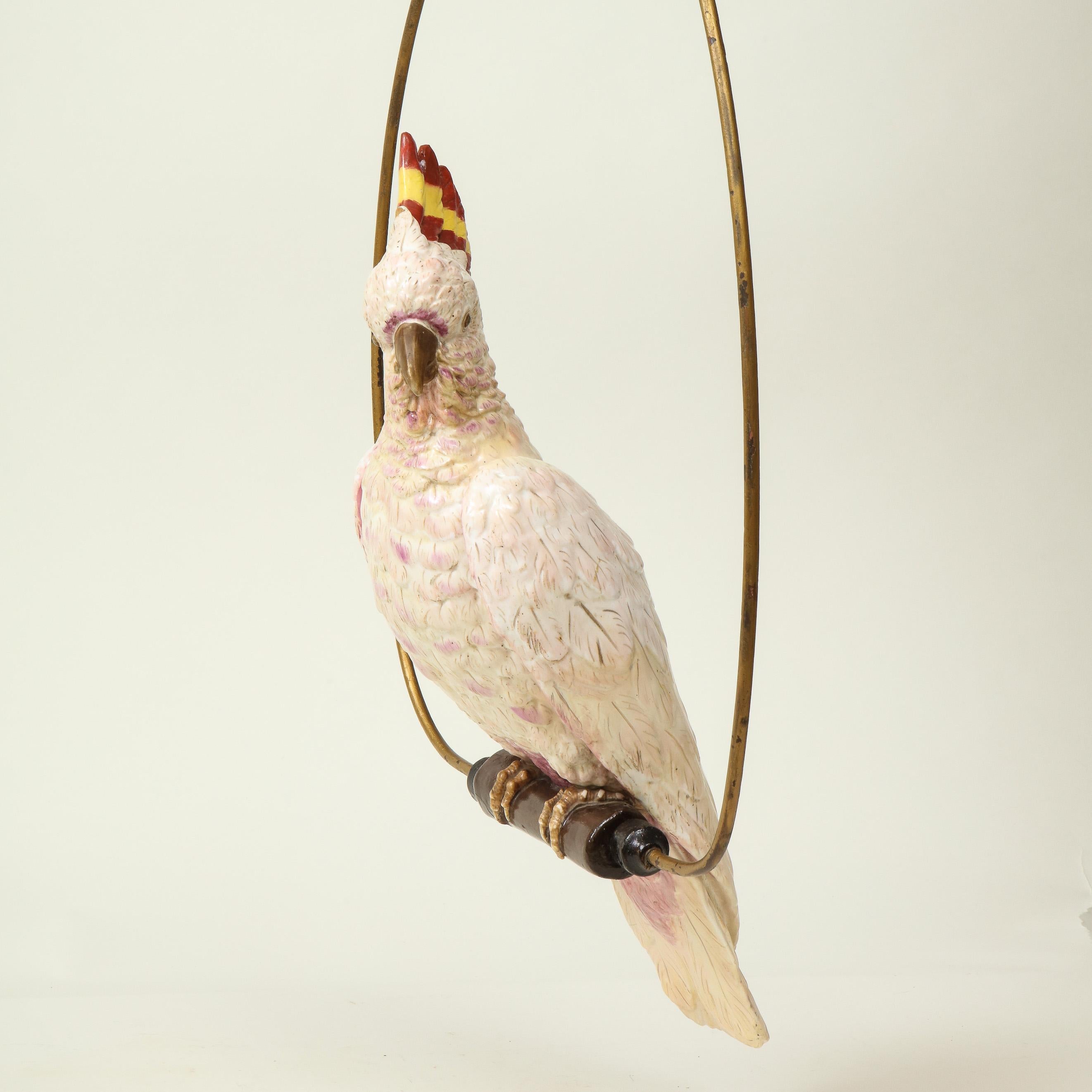 Glazed Continental Porcelain Model of a Major Mitchells Cockatoo with Ring