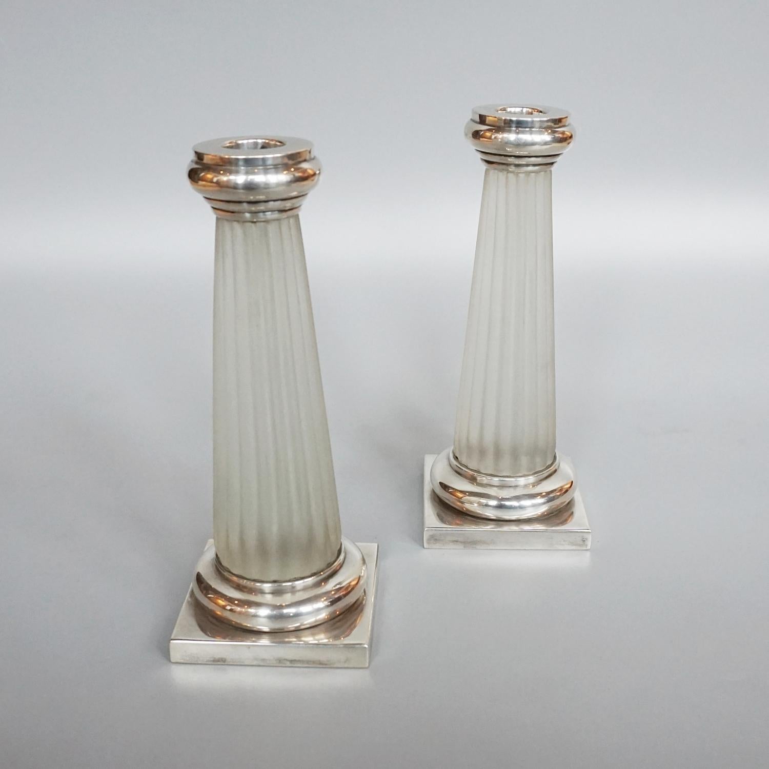 silver and glass candlesticks