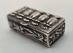 Continental silver snuff box depicting a row of five perched birds circa 1880