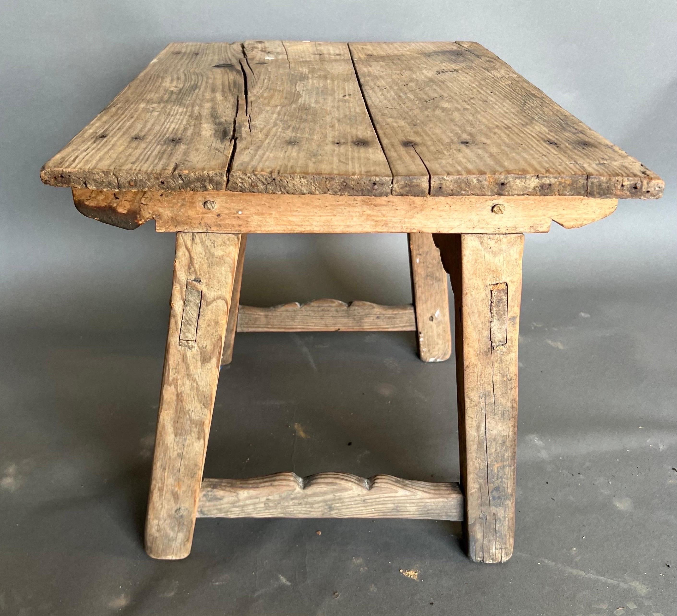 European Continental stripped pine side table For Sale