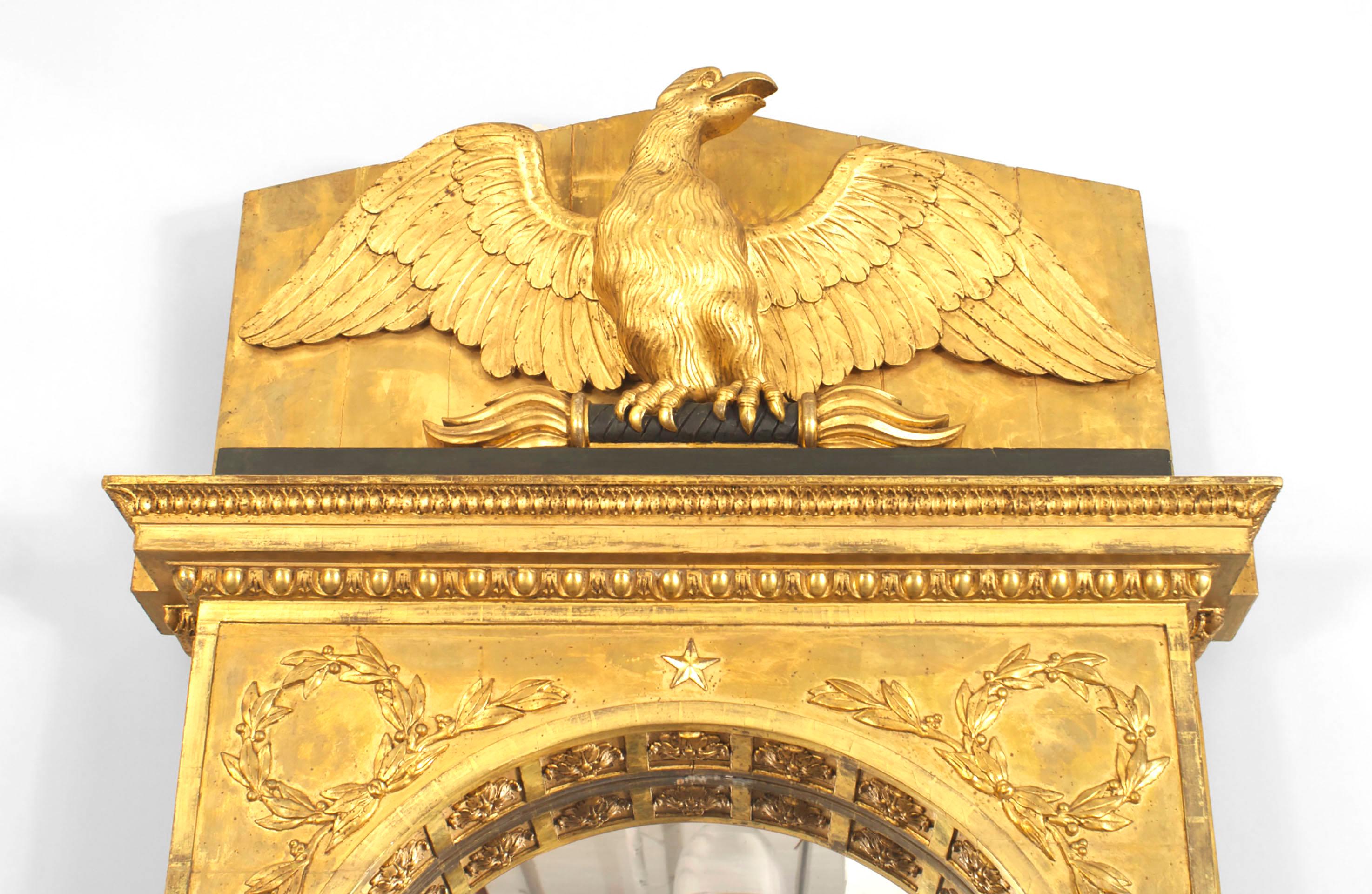 Continental Swedish Empire Gilt and Ebonized Eagle Pediment Wall Mirror In Good Condition For Sale In New York, NY