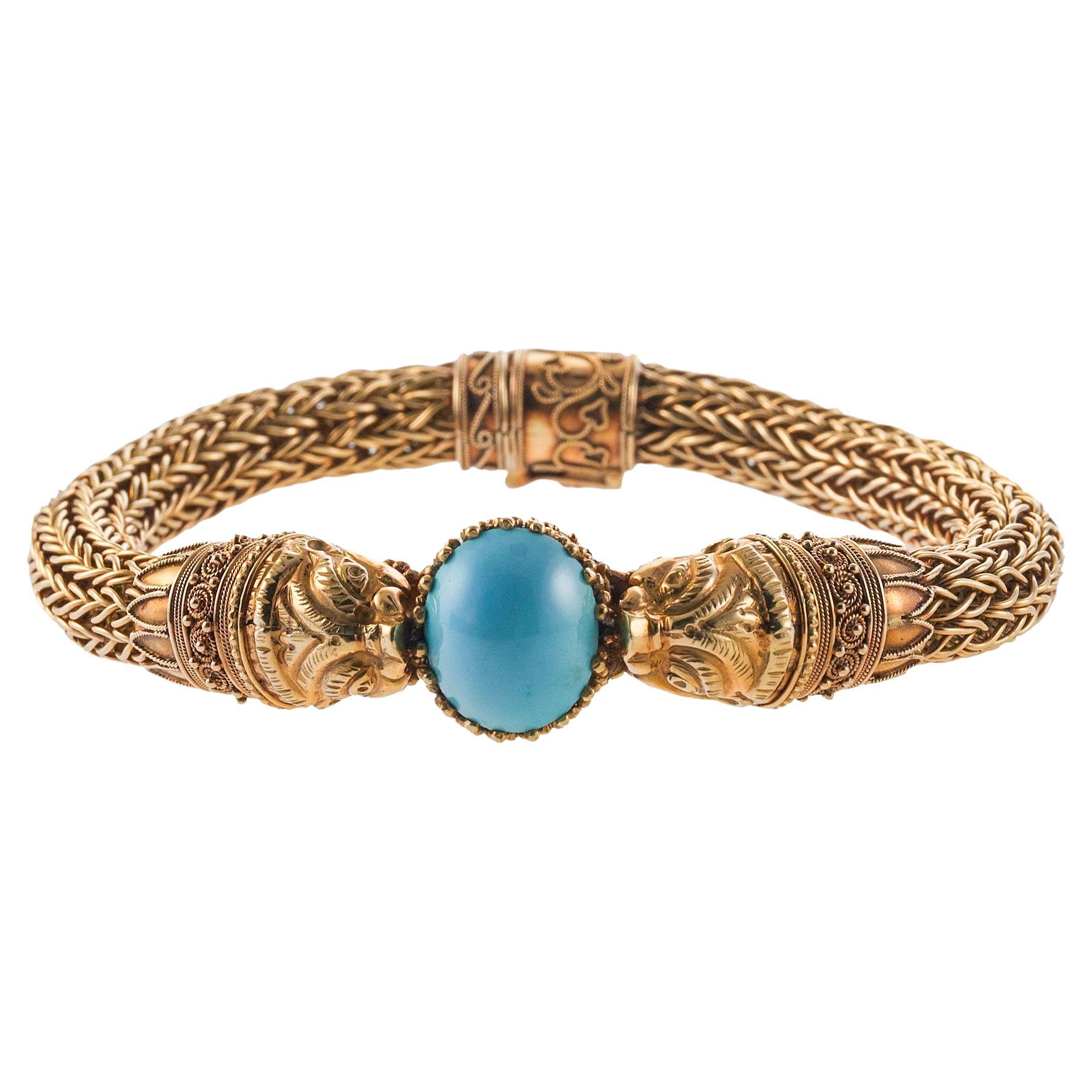 Continental Turquoise Gold Chimera Bracelet For Sale