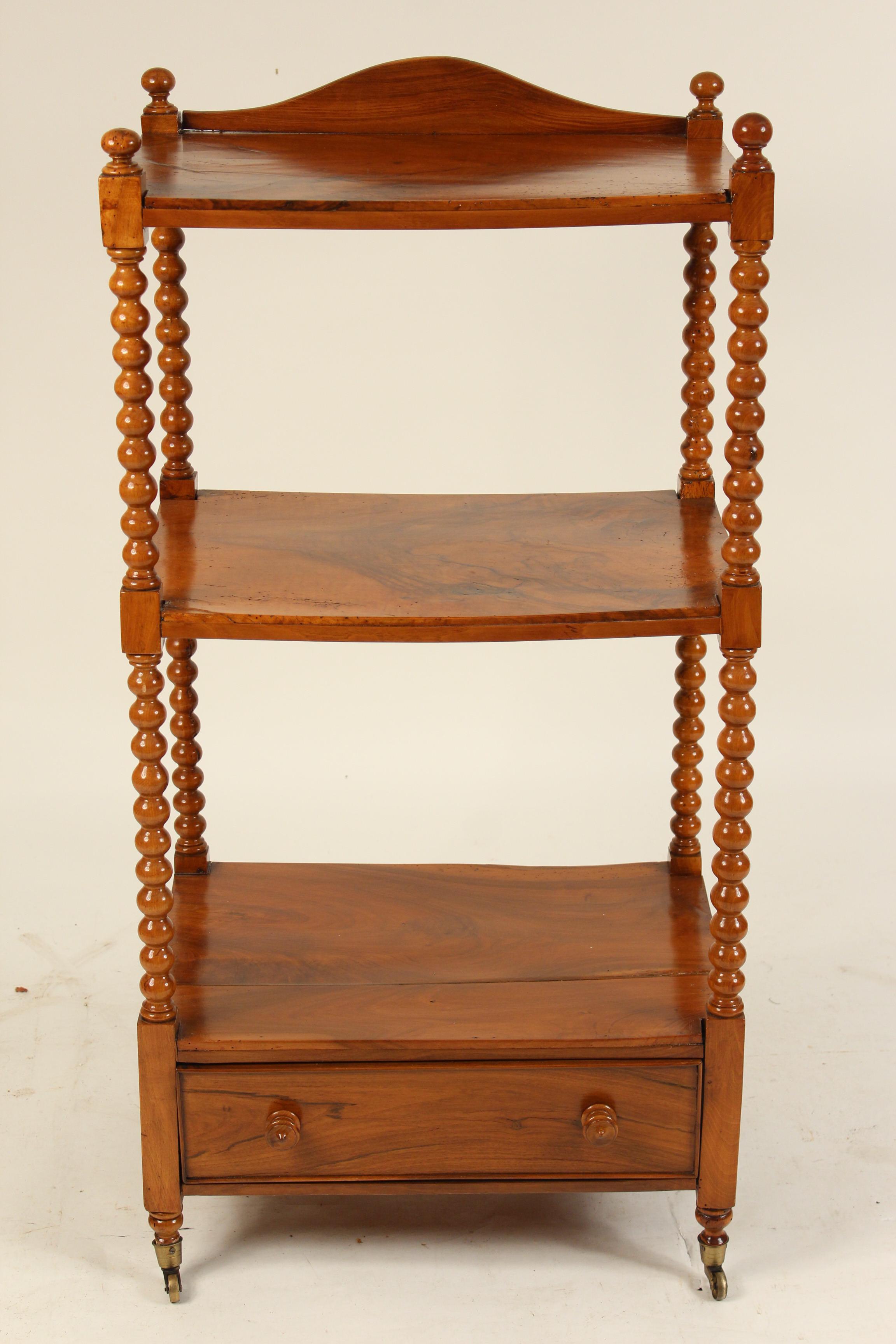 Continental walnut, burl walnut and beechwood 3-tier étagère with bobbin turned stiles, late 19th century.