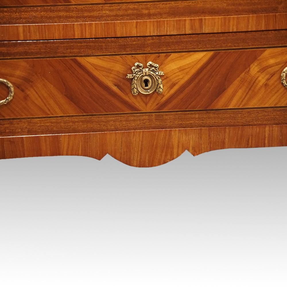 Continental marble-top commode
This Continental marble-top commode was made circa 1920
It is fitted 3 drawers the top drawer with parquetry inlay, the 2 drawers below with chevron design in kingwood, all with the original handles.
The commode has