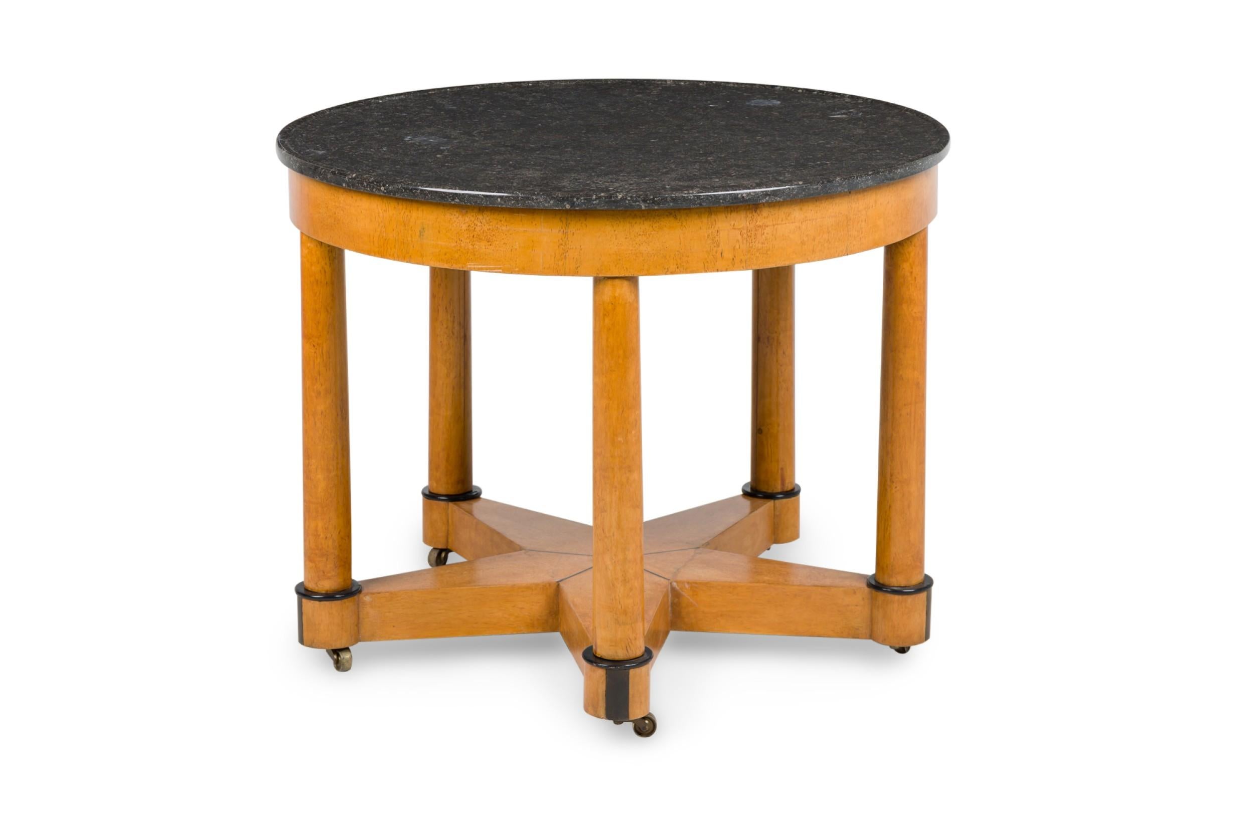 Etched Continential Round Center Table Resting on 5 Legs & Speckled Black Marble Top
