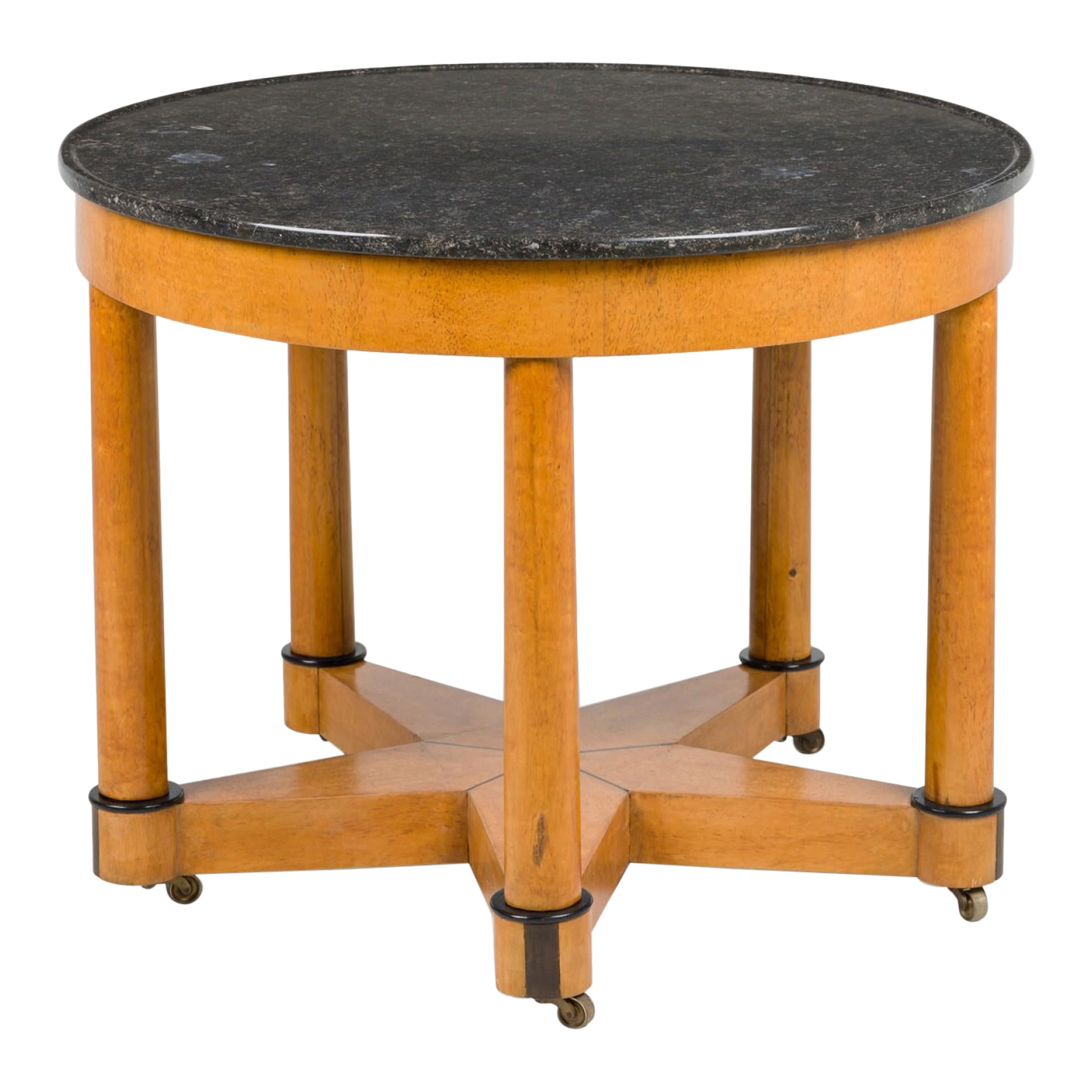 Continential Round Center Table Resting on 5 Legs & Speckled Black Marble Top