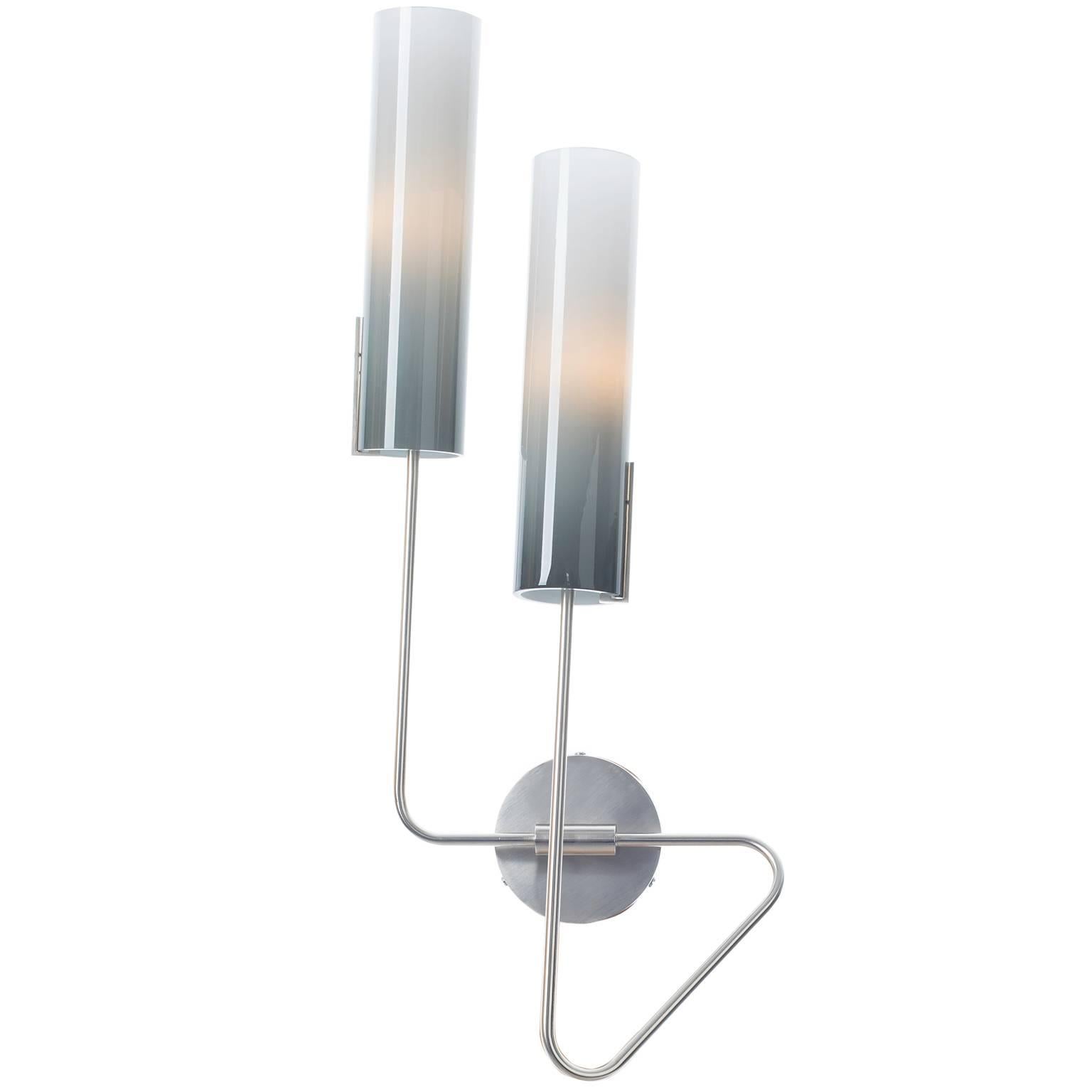 The Continuum collection comprises five sconce models and multiple large scale chandeliers. Sconces are available handed for symmetrical installations.  Hand blown glass shades are made to order in Brooklyn.

Glass Shades: hand blown glass in solid