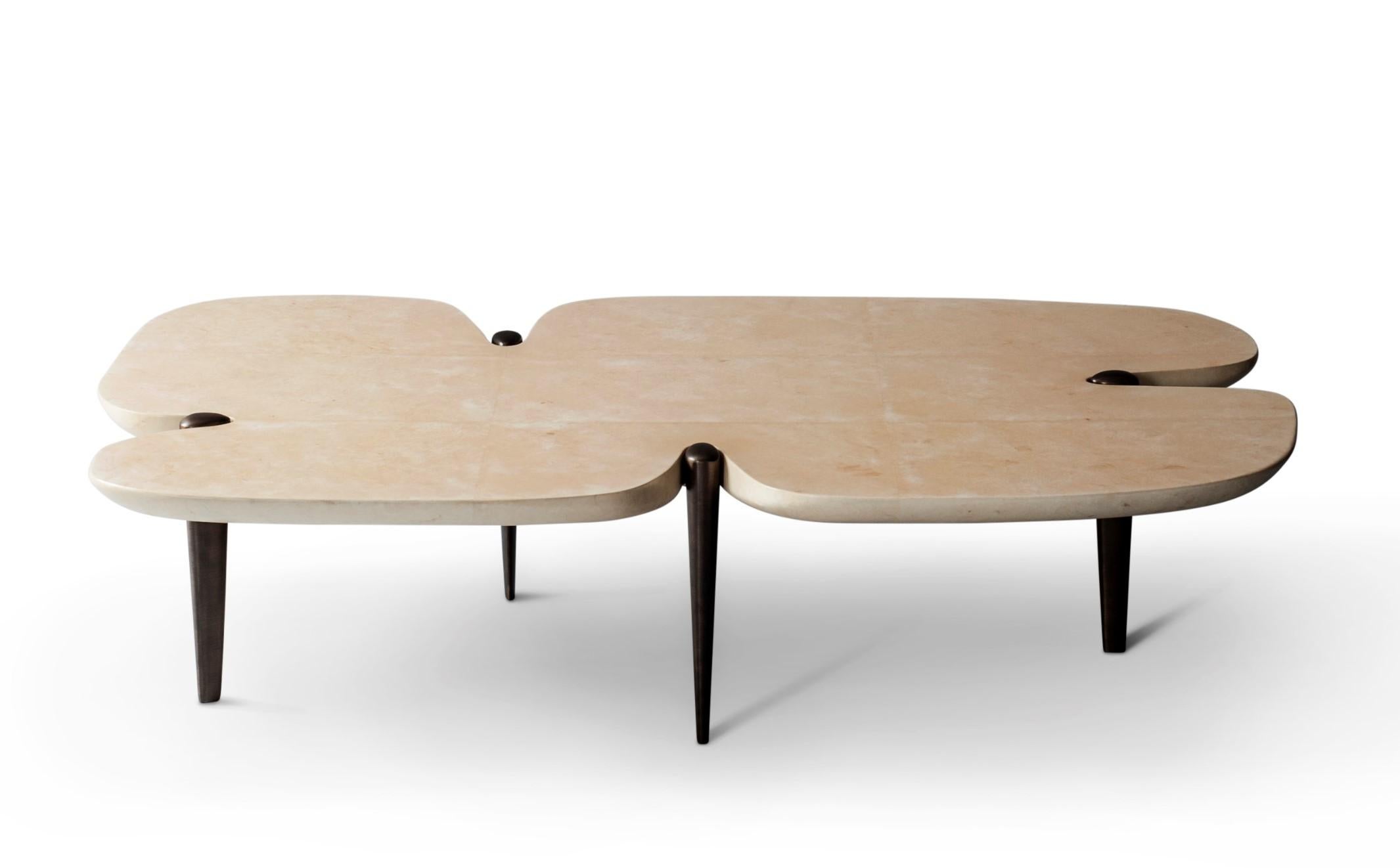 Contour coffee table by DeMuro Das
Dimensions: W 160 x D 99.5 x H 39.5 cm
Materials: Carta (Ivory), matte
Solid bronze (antique) legs

 Dimensions and finishes can be customized.

DeMuro Das is an international design firm and the aesthetic