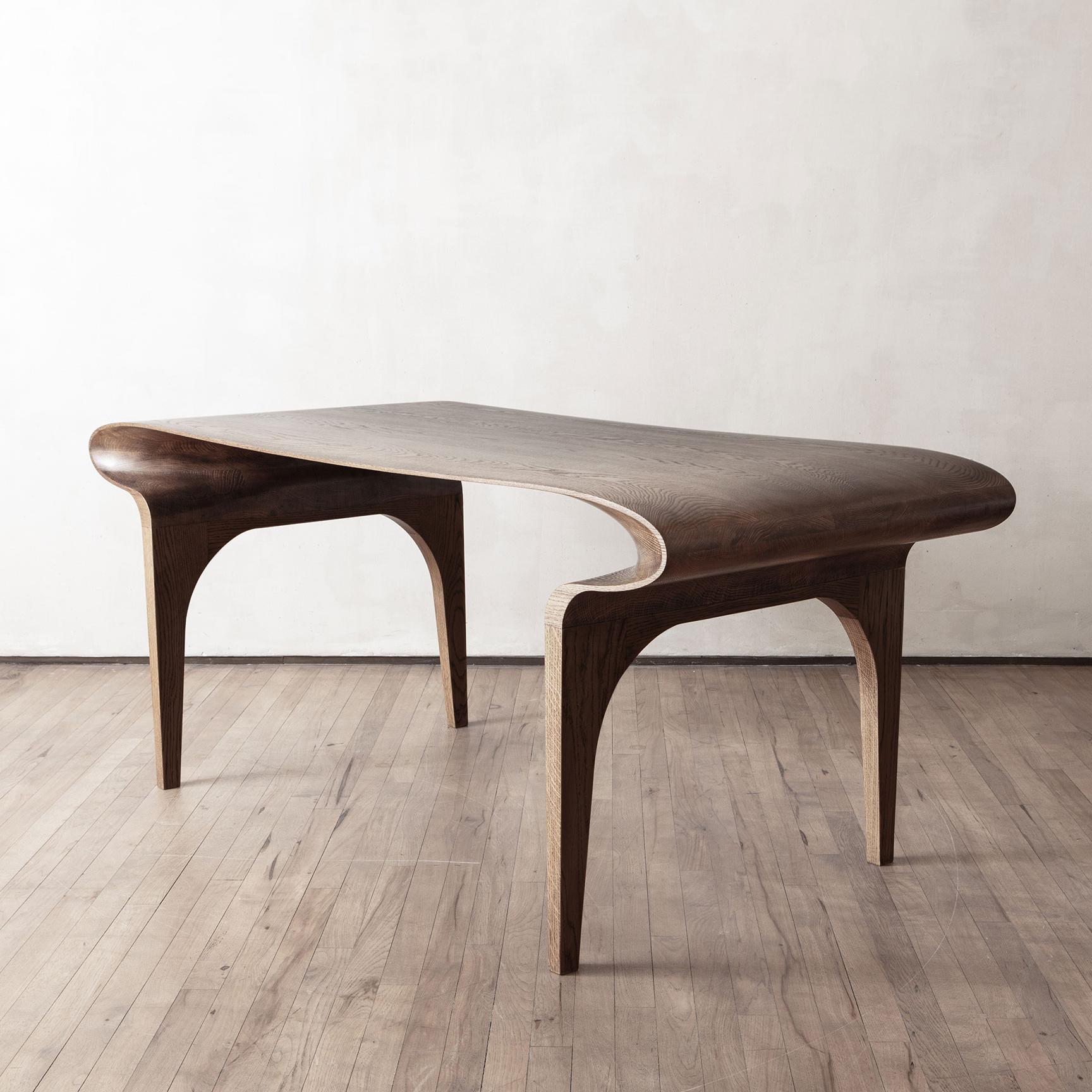 Inspired by the clean, organic silhouettes and elegant simplicity of the 20th Century Art Nouveau, Sperlein first introduced the Contour Collection in 2009. The fluid curves of the wood piece result from the time-honored woodcraft techniques and