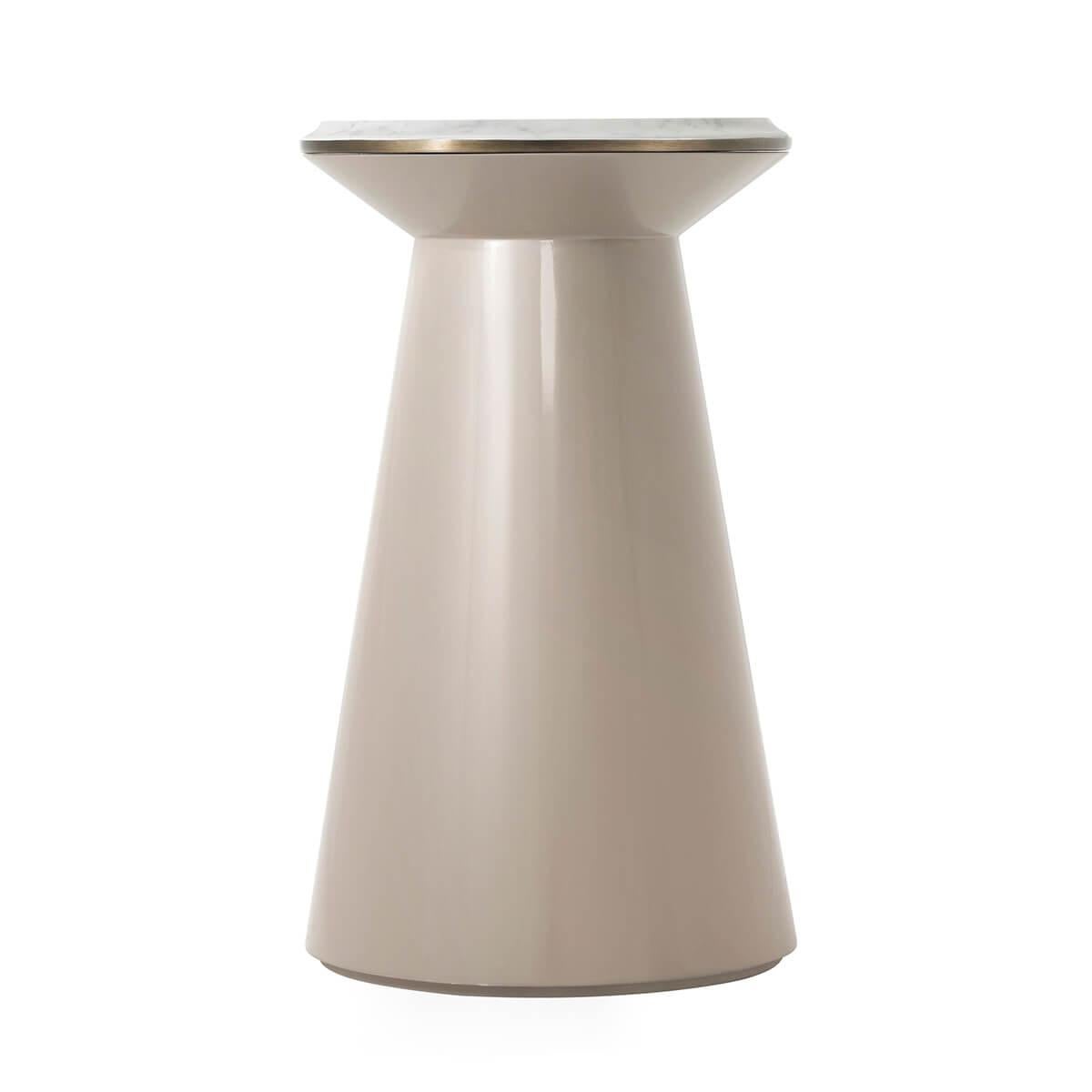 With a marble top, and a heritage bronze finish molded edge. The tapered cylinder base in a vintage taupe lacquer finish.

Dimensions: 13.75
