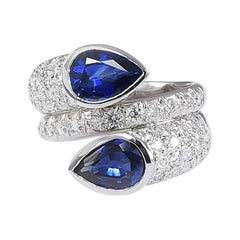 Contraire 18 Karat White Gold Ring with Sapphires and Diamonds