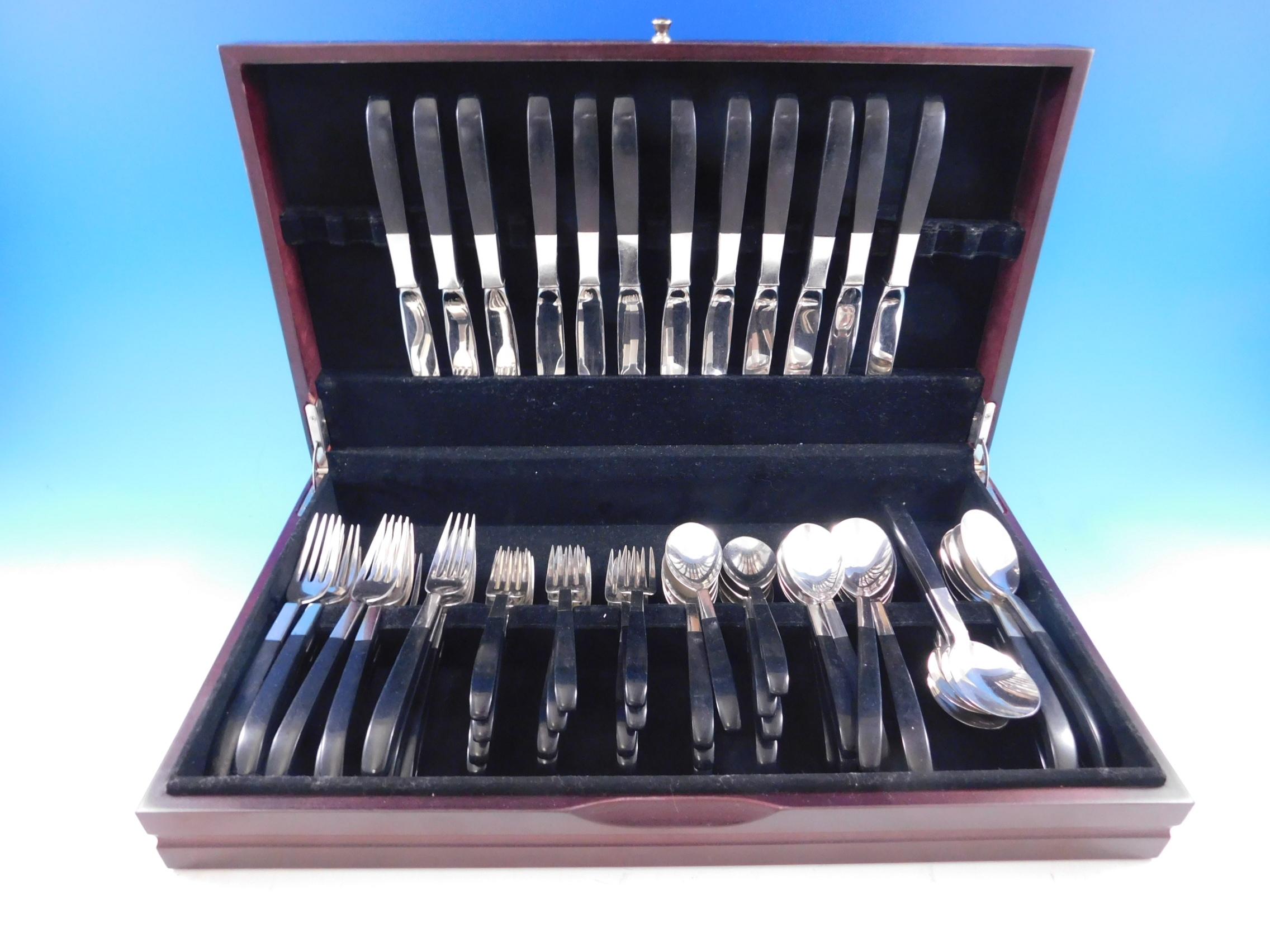 Mid-Century Modern Contrast by Lunt sterling silver with nylon handle Flatware set, designed by Nord Bowlen of Greenfeld, MA in 1956. This set includes:

12 knives w/stainless blades, 9 1/4