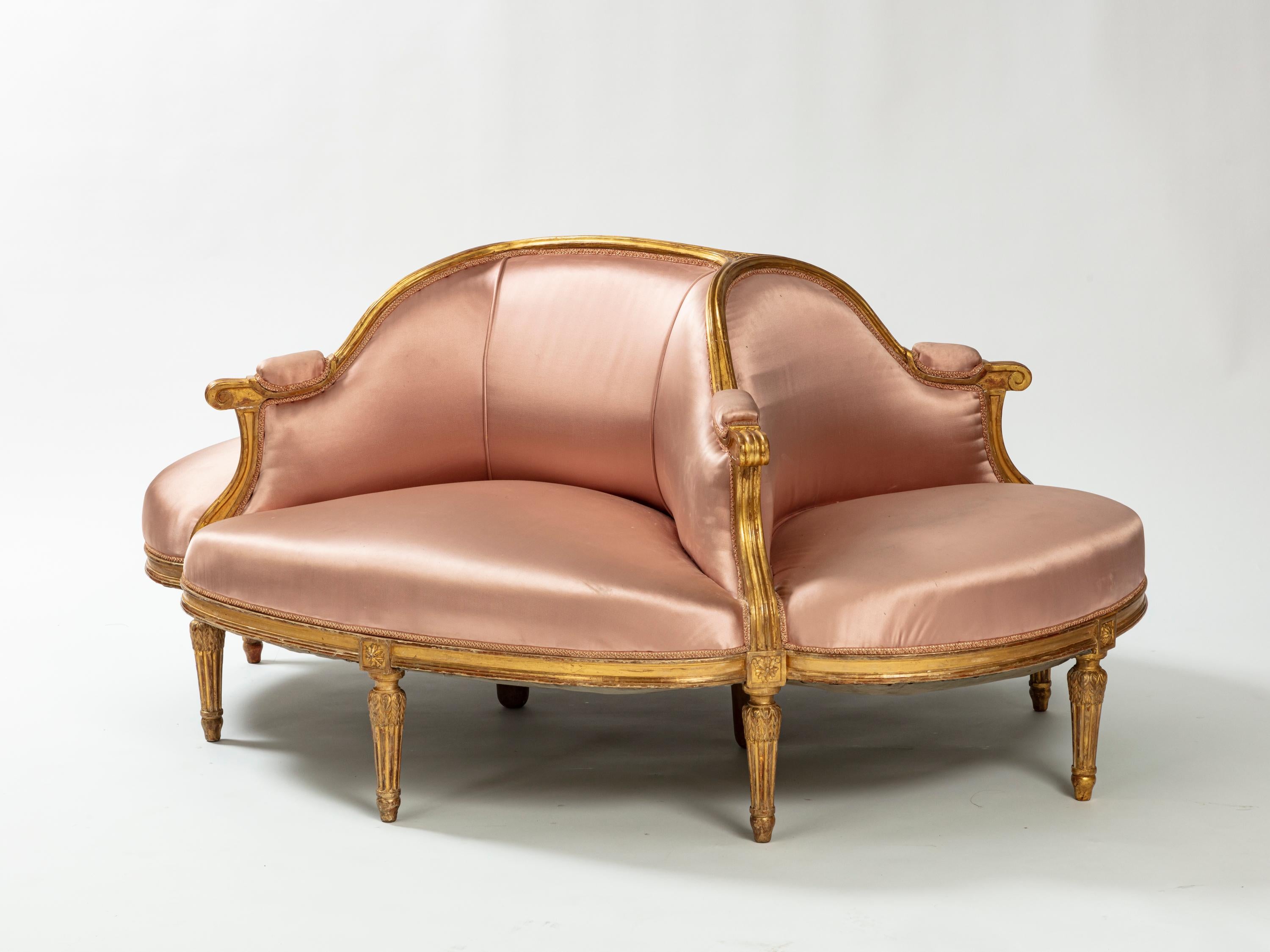 A central seat, also called “borne” from the Napoleon III period, circa 1860. Gilt wood frame, upholstered with beige rose satin silk fabric.