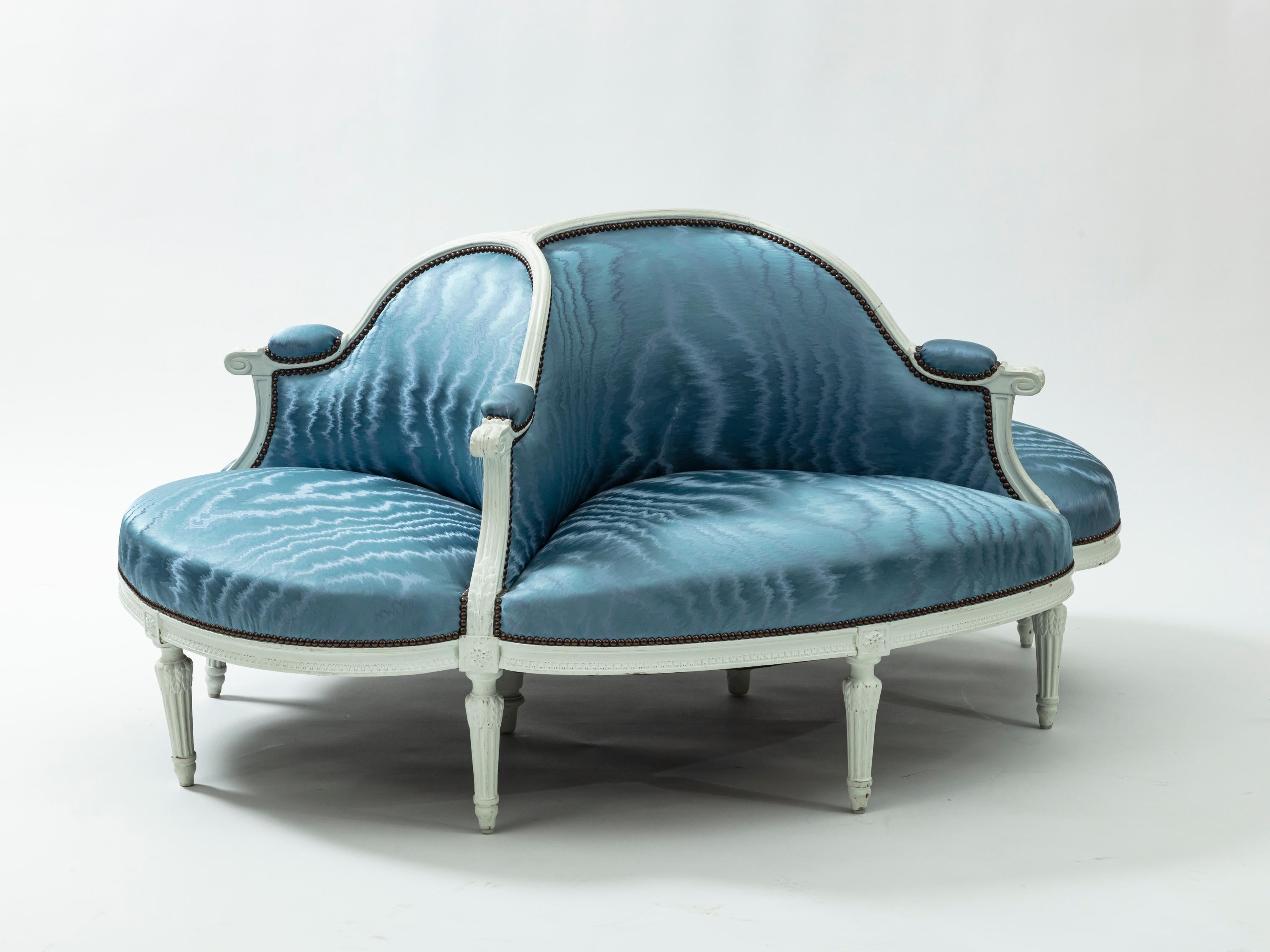 A central seat, also called “borne” from the Napoleon III period, circa 1860. Painted white wood frame, upholstered with 