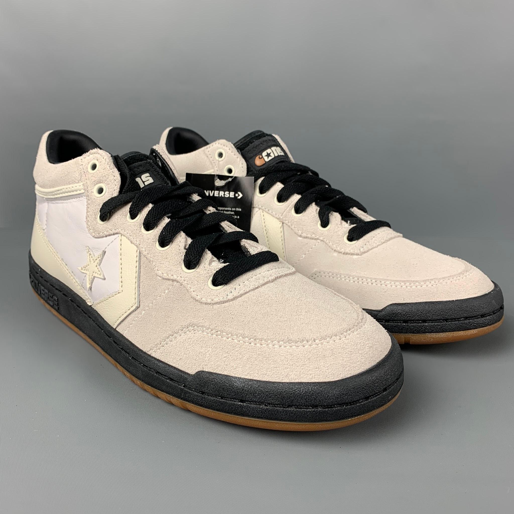 CONVERSE x CARHARTT WIP sneakers comes in a white & black suede featuring a high top style, rubber sole, and a lace up closure. 

New With Box.
Marked: 9.5

Outsole: 12 in. x 4 in. 