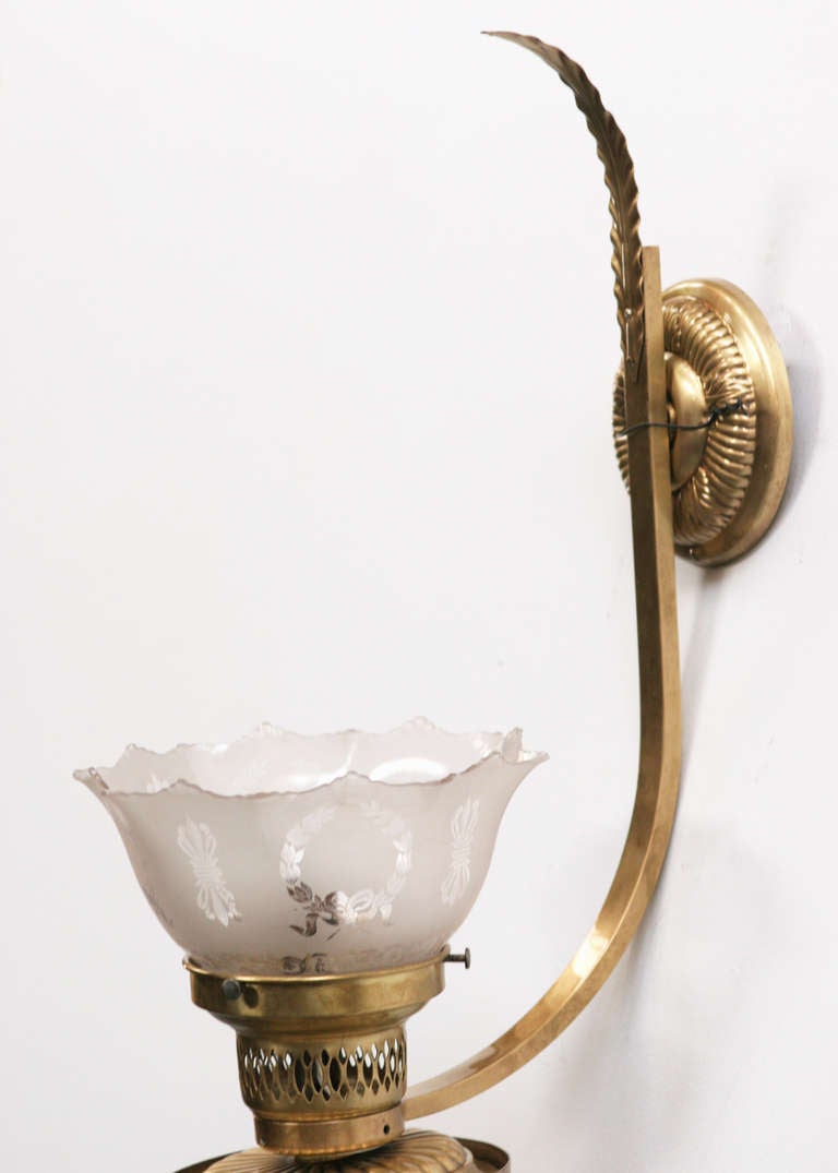 Converted in the early 20th century, this Edwardian-era brass wall oil lamp creates a terrific period focal point for the dining room or foyer.



Available five.
