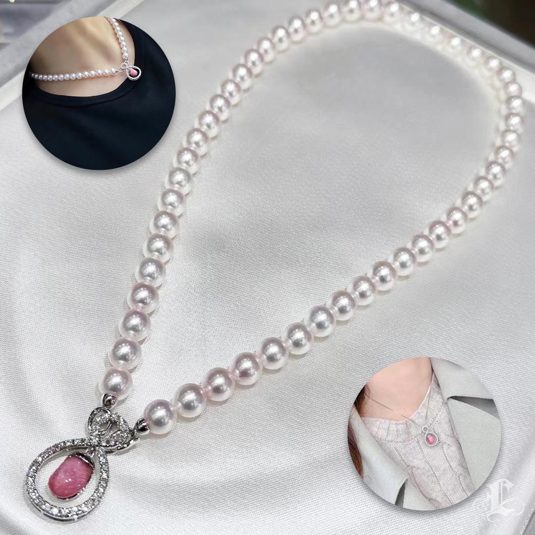 Dieses exquisite Stück zeigt eine seltene, leuchtend rosa Muschelperle mit ihren charakteristischen flammenartigen Mustern, eingefasst in einen schimmernden Heiligenschein aus sorgfältig angeordneten Diamanten. Der vielseitige Verschluss des