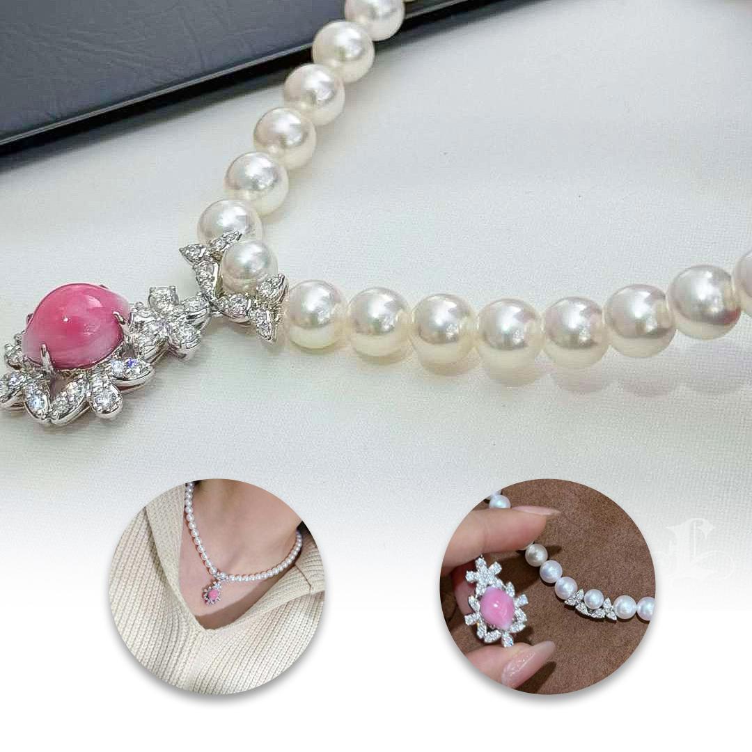 This captivating jewelry set combines the delicate charm of a blush-pink conch pearl pendant with the luminous beauty of a Japanese Akoya pearl necklace. The pendant features a vibrant conch pearl surrounded by sparkling diamonds, exuding