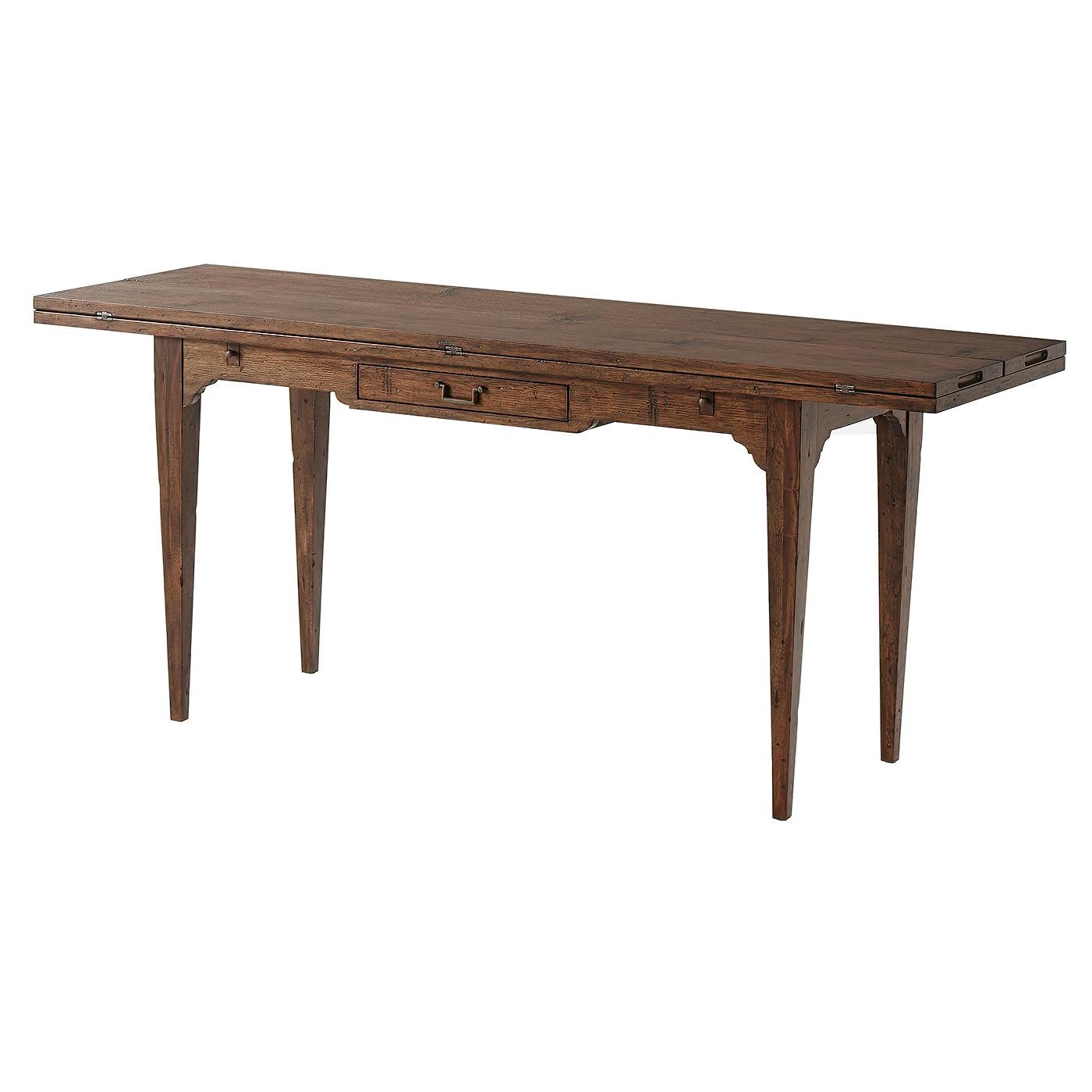 A convertible fold over console / dining table. With a frieze drawer, of mahogany and hickory veneers in an aged hickory finish on square tapering legs.
Dimensions:
Open 72
