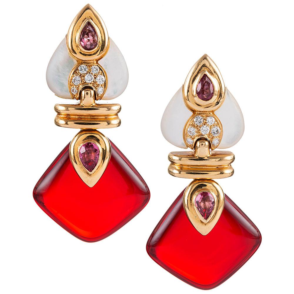 These earrings are highly reminiscent of Bulgari- or Marina B’s iconic designs and are signed 