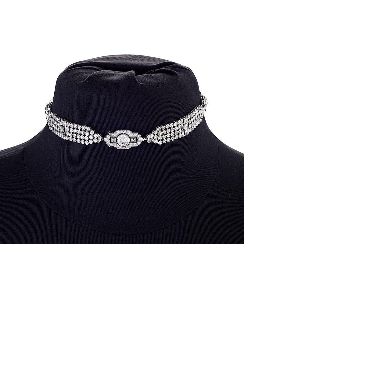A masterful achievement in jewelry design, this multi-use diamond platinum collar necklace from the early 20th century easily converts between two lengths of necklace, and can also be worn as a pair of bracelets. Comprised of three separate parts,