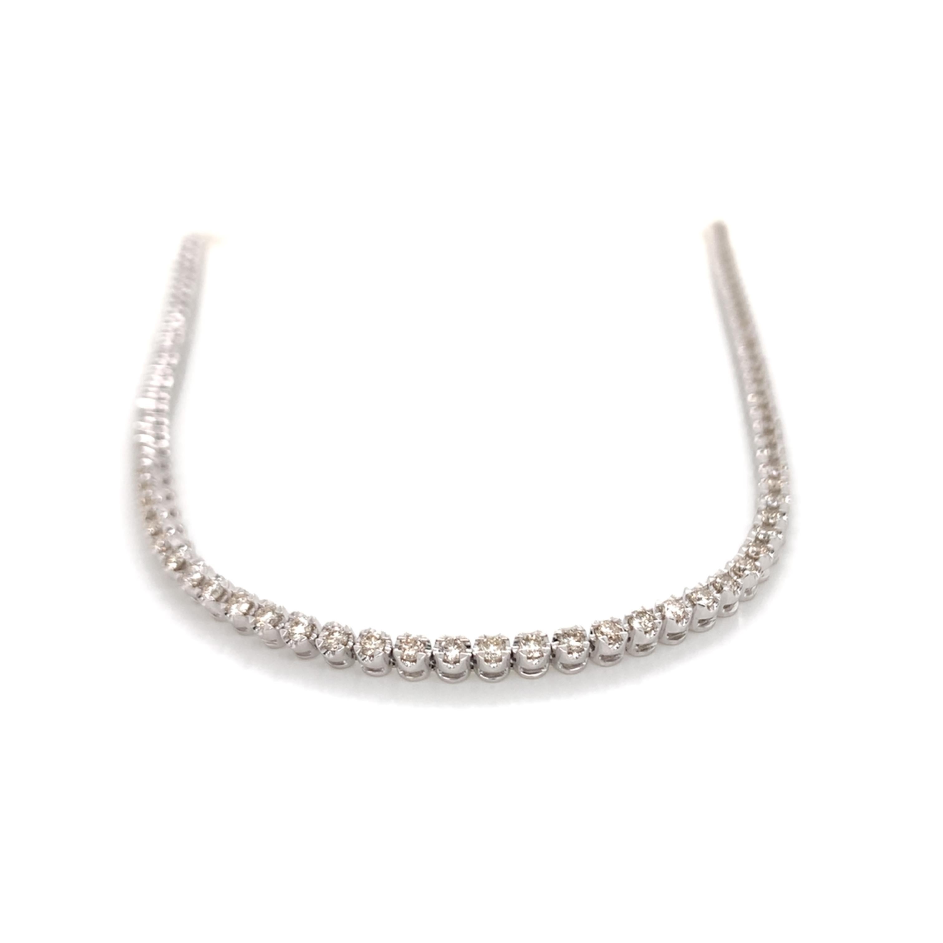 Tennis necklace convertible to tennis bracelet made with real/natural brilliant cut diamonds. Total Diamond Weight: 2.53 carats. Diamond Quantity: 98 round diamonds. Color: J-K. Clarity: VS2-SI1. Mounted on 18kt white gold.
