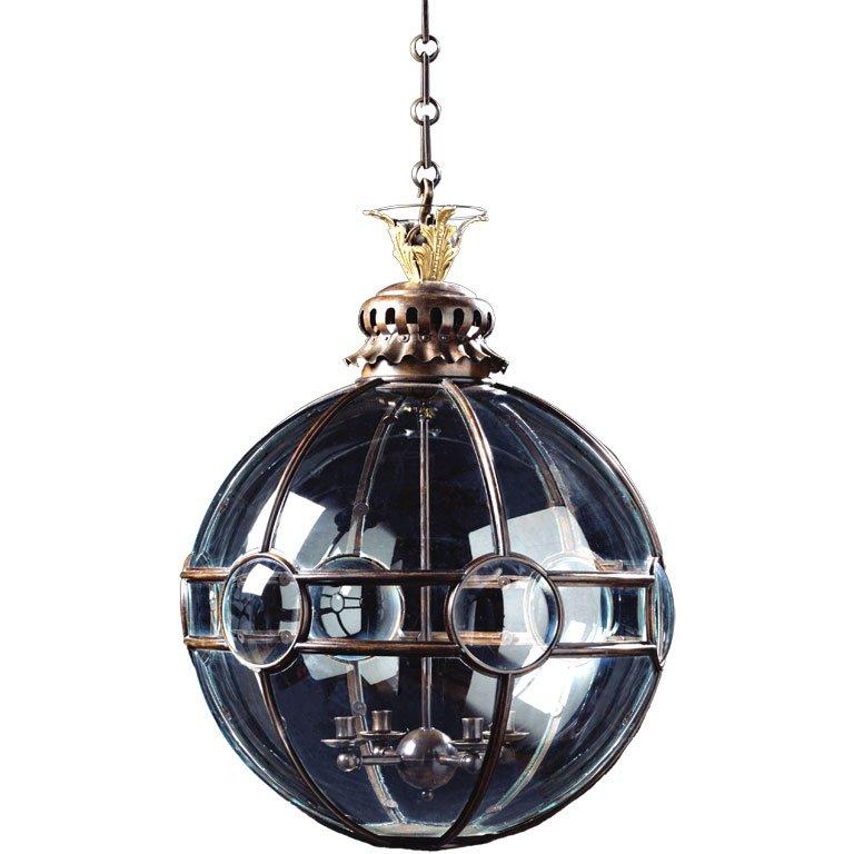 This fully glazed spherical lantern has unusual convex glass panels fitted around the meridian. The effect of candle, or electric light on the panels gives a magical glow.
Also available in a smaller size.
    